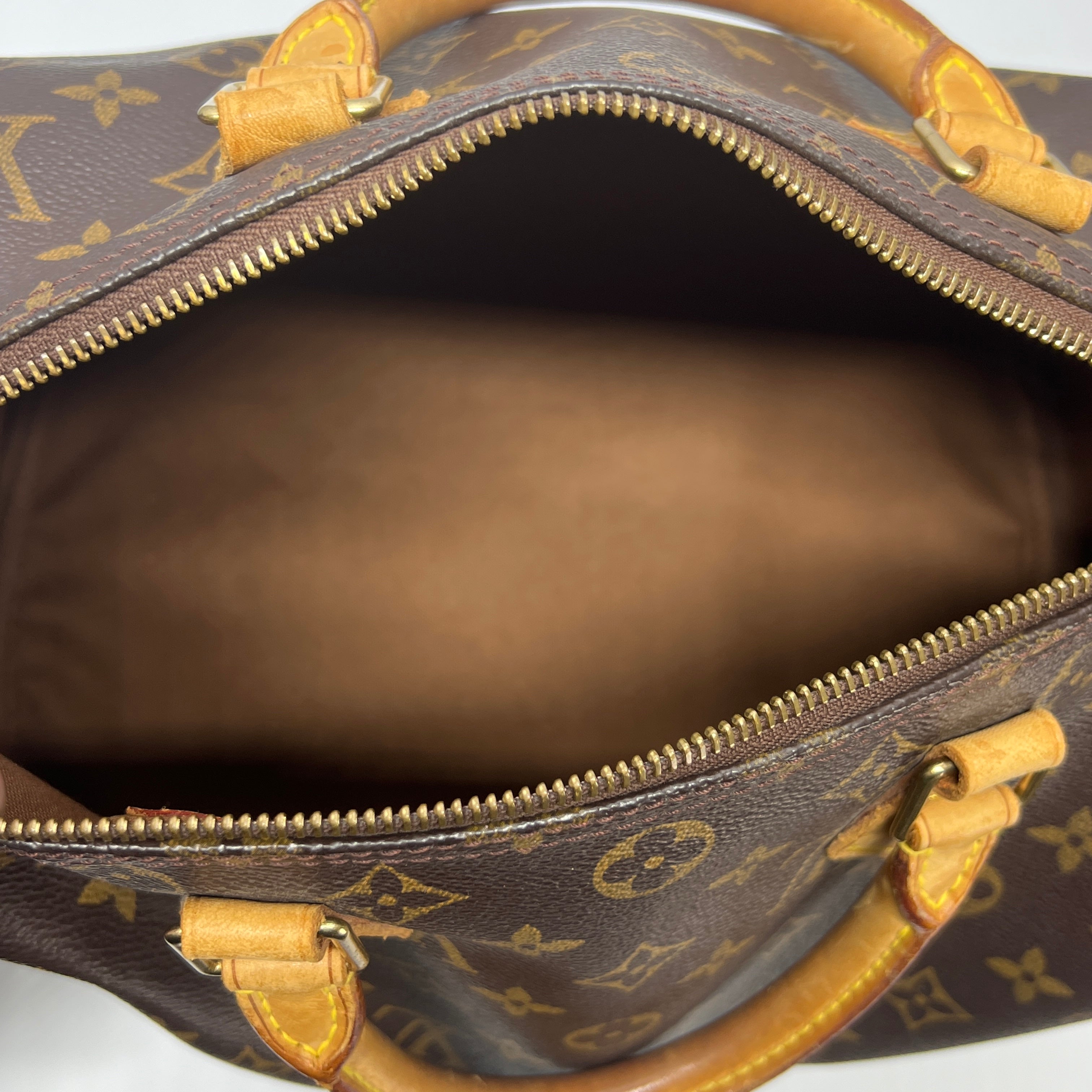 LOUIS VUITTON Speedy 30 canvas and brown leather handbag