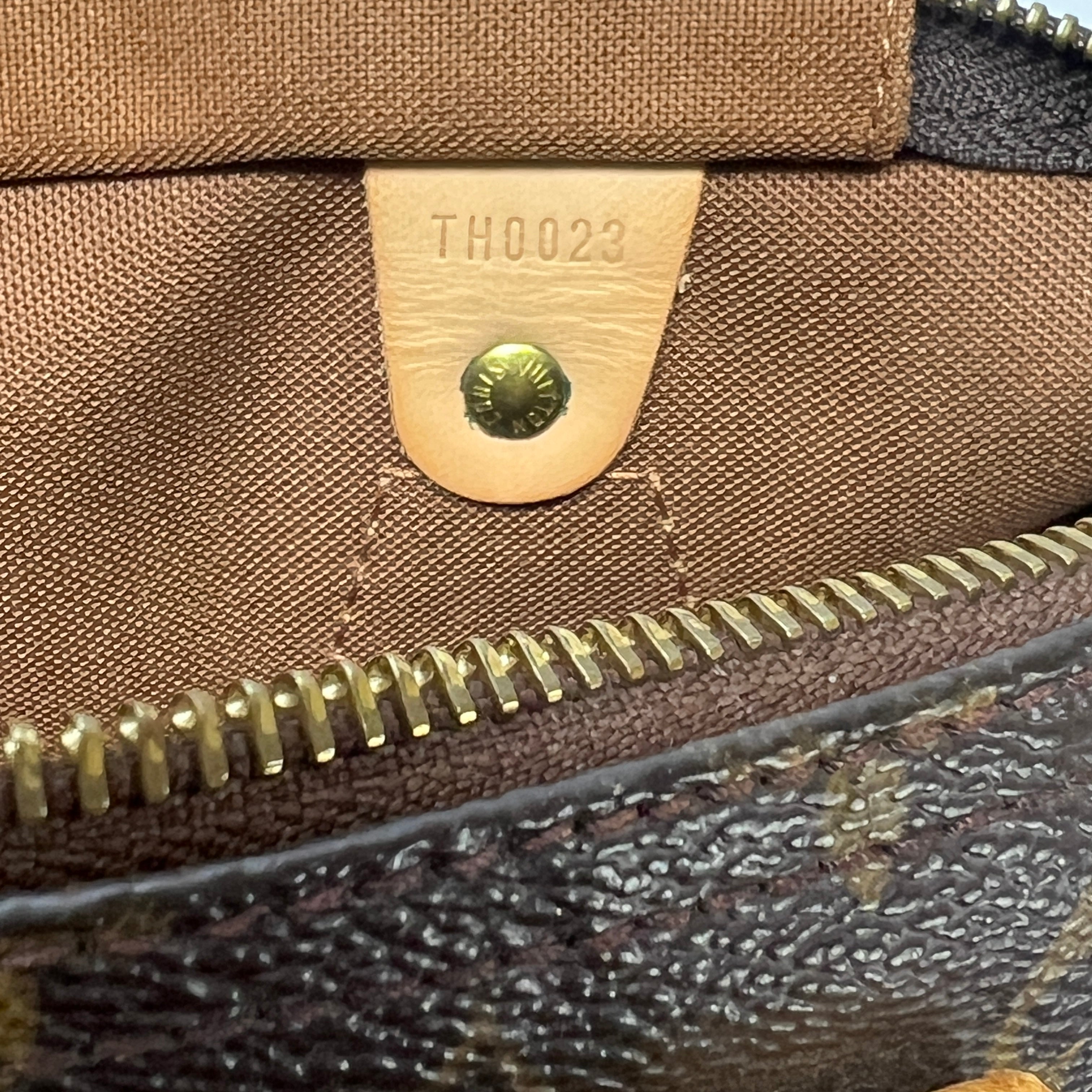 LOUIS VUITTON Speedy 30 canvas and brown leather handbag