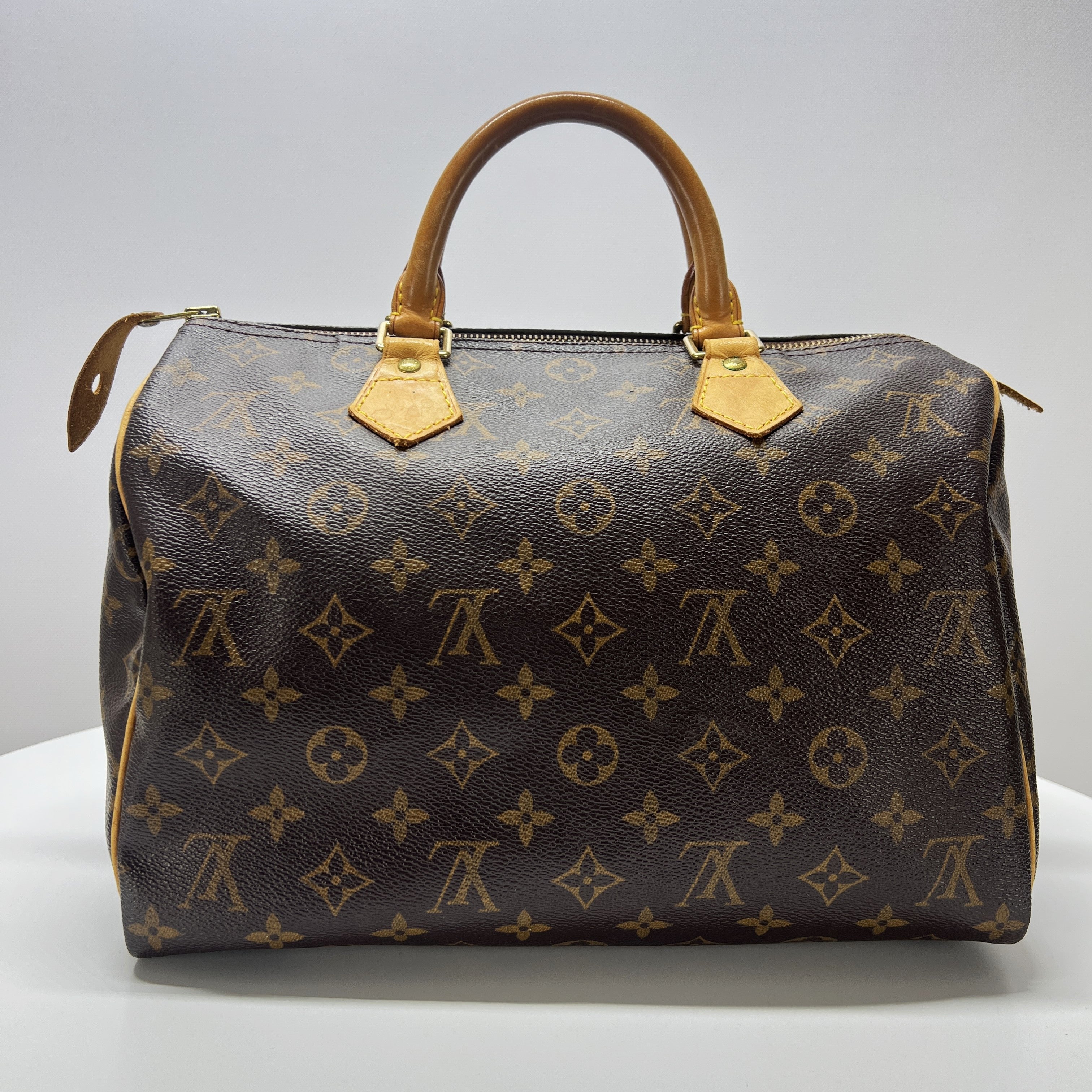 LOUIS VUITTON Speedy 30 canvas and brown leather handbag