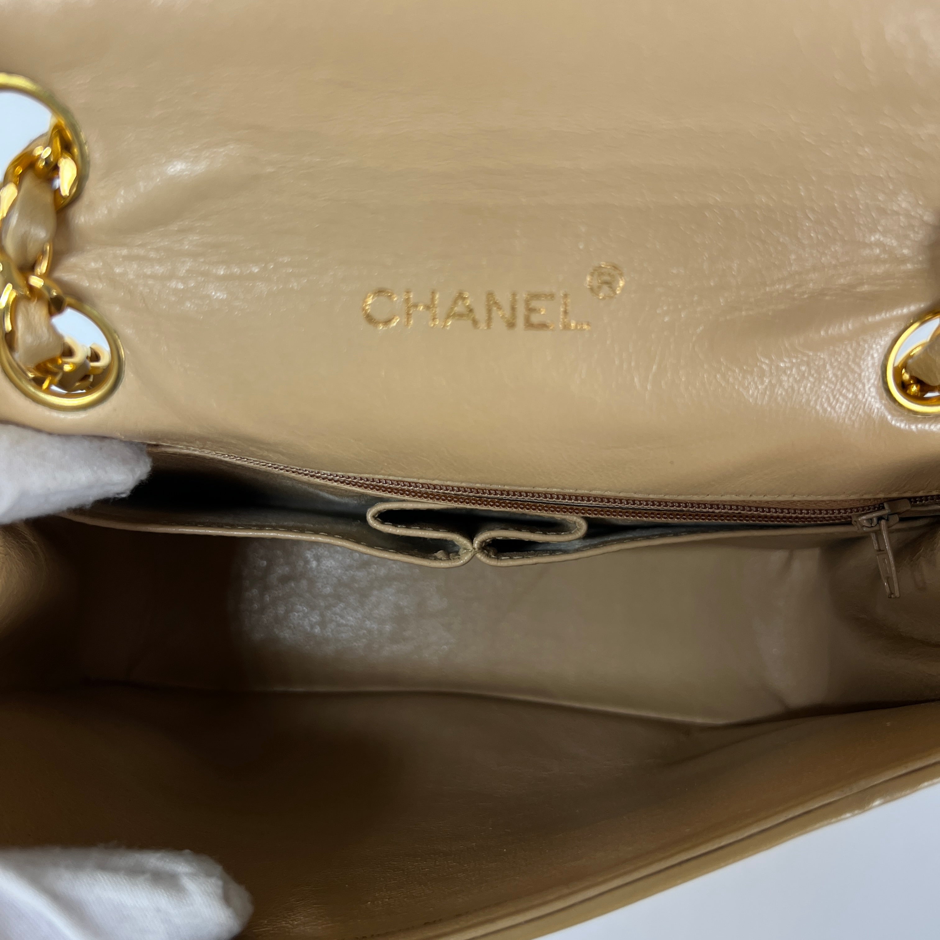 CHANEL Timeless classic quilted single flap beige leather handbag