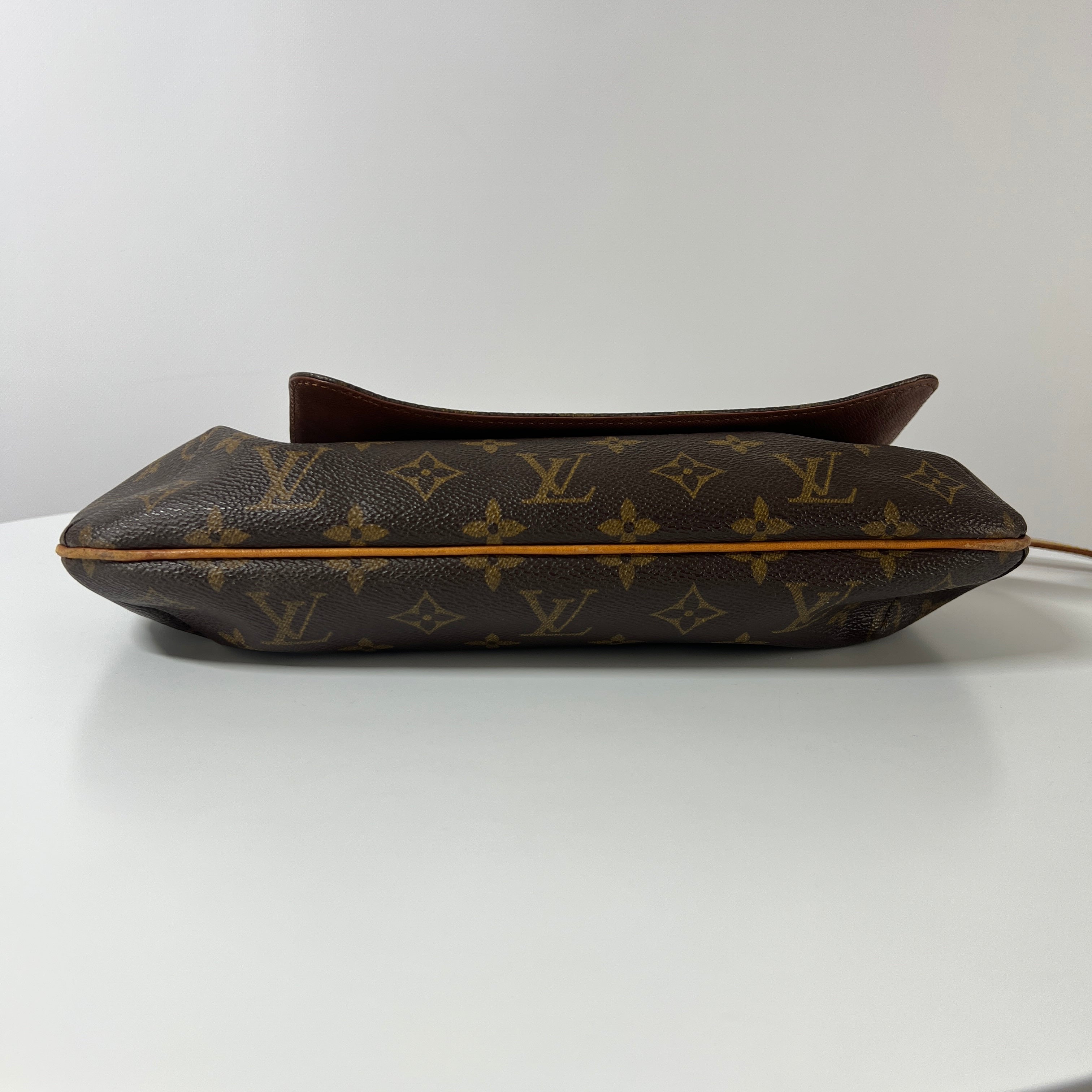 LOUIS VUITTON Tango canvas and brown leather handbag