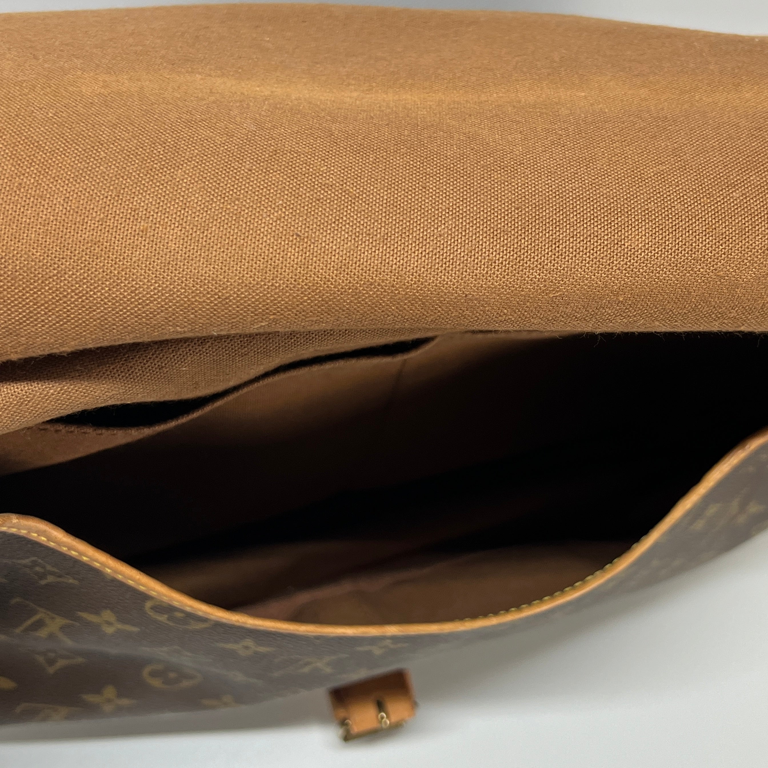 LOUIS VUITTON Saumur 30 canvas and brown leather handbag
