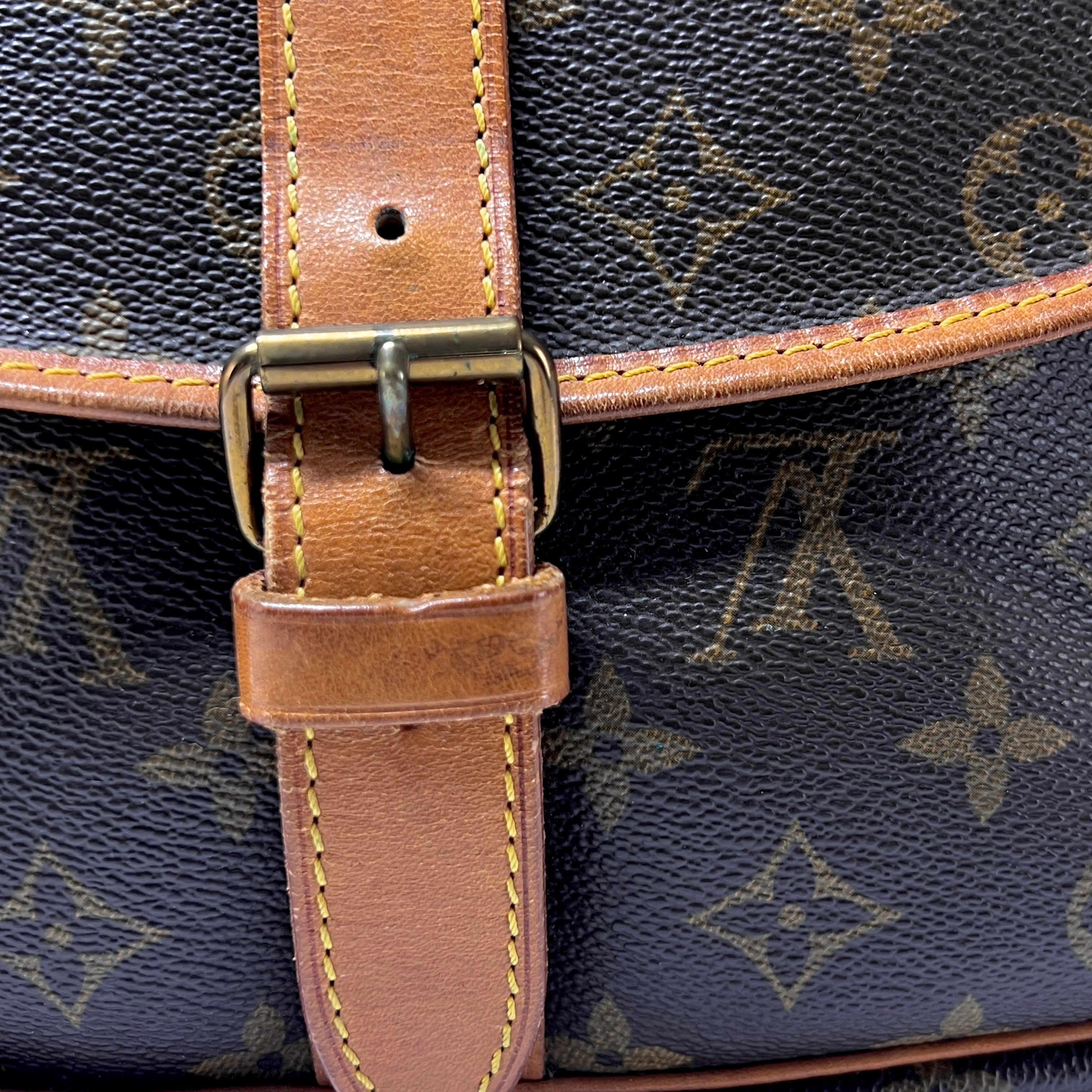 Sac à main LOUIS VUITTON Saumur 35 toile et cuir marron