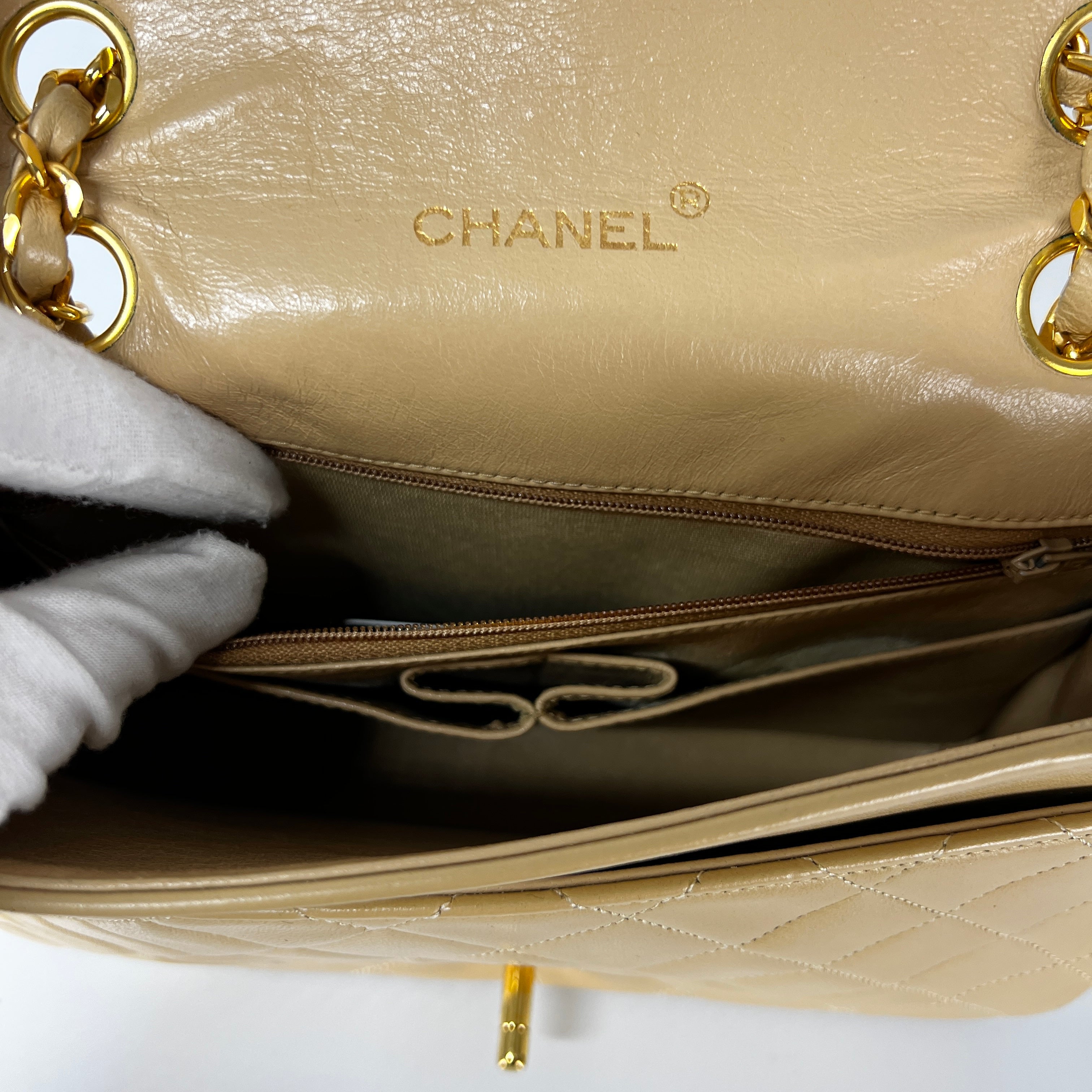 CHANEL Timeless classic quilted single flap beige leather handbag