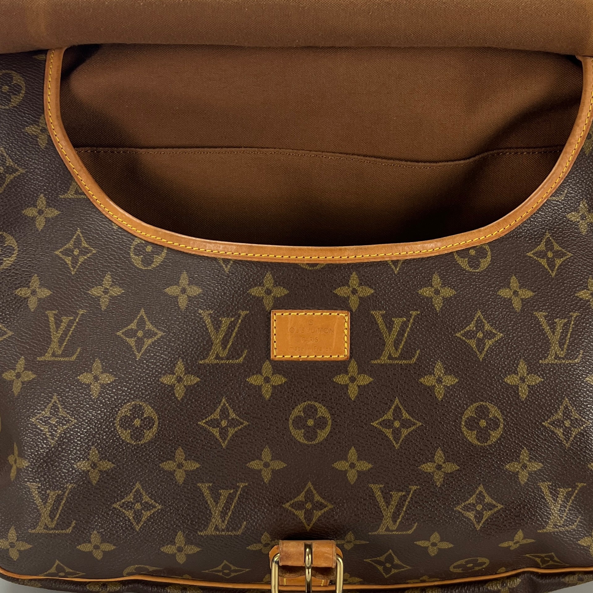 LOUIS VUITTON Saumur 30 canvas and brown leather handbag