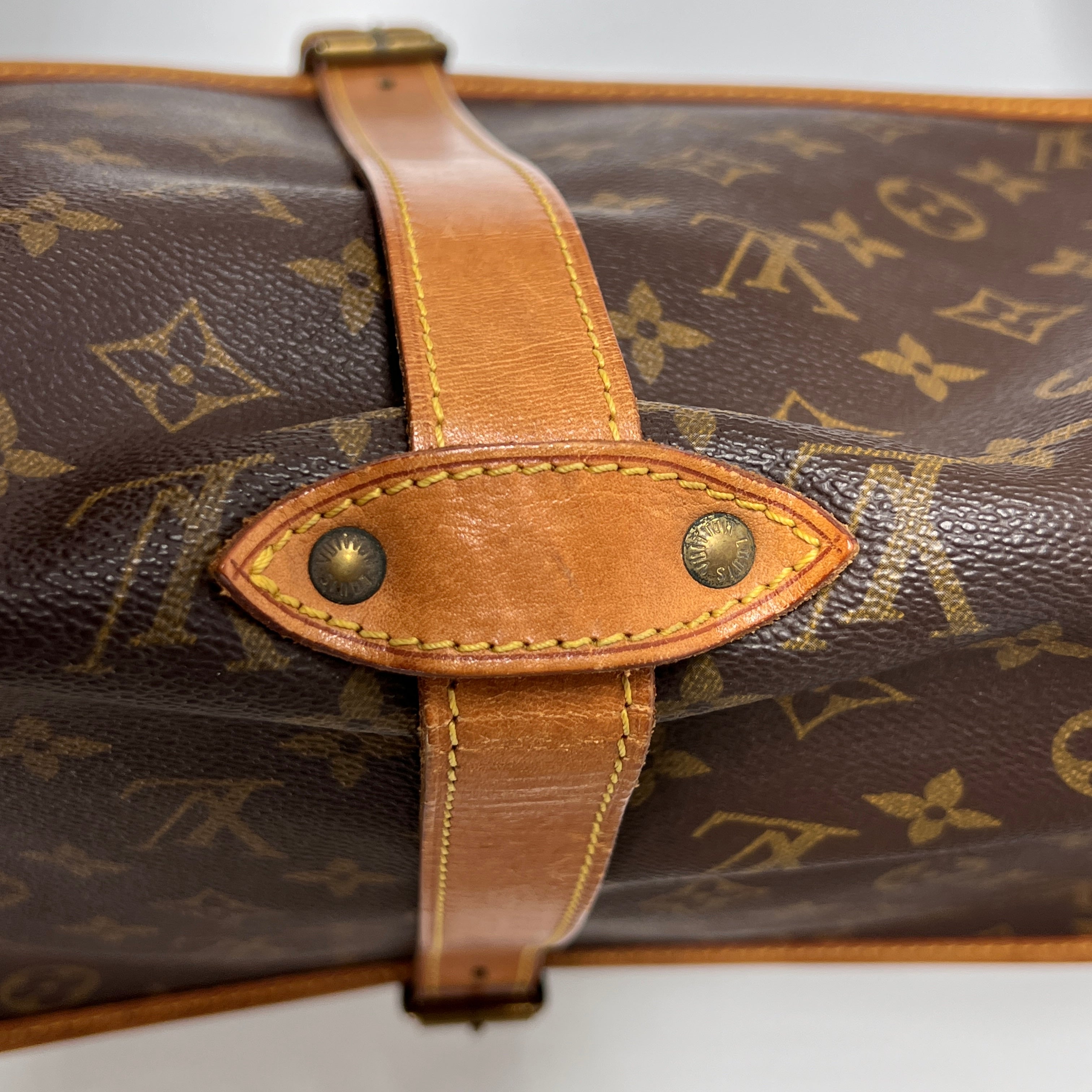 Sac à main LOUIS VUITTON Saumur 35 toile et cuir marron