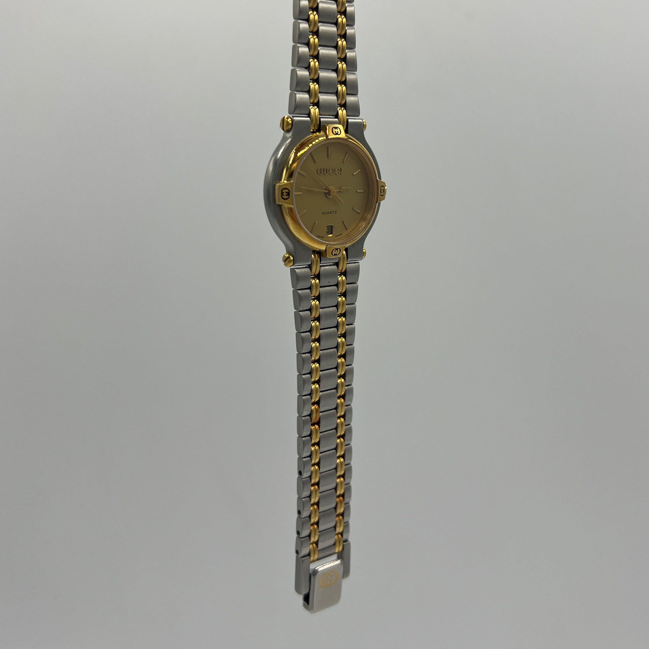 Montre GUCCI 9000 L acier Bicolore