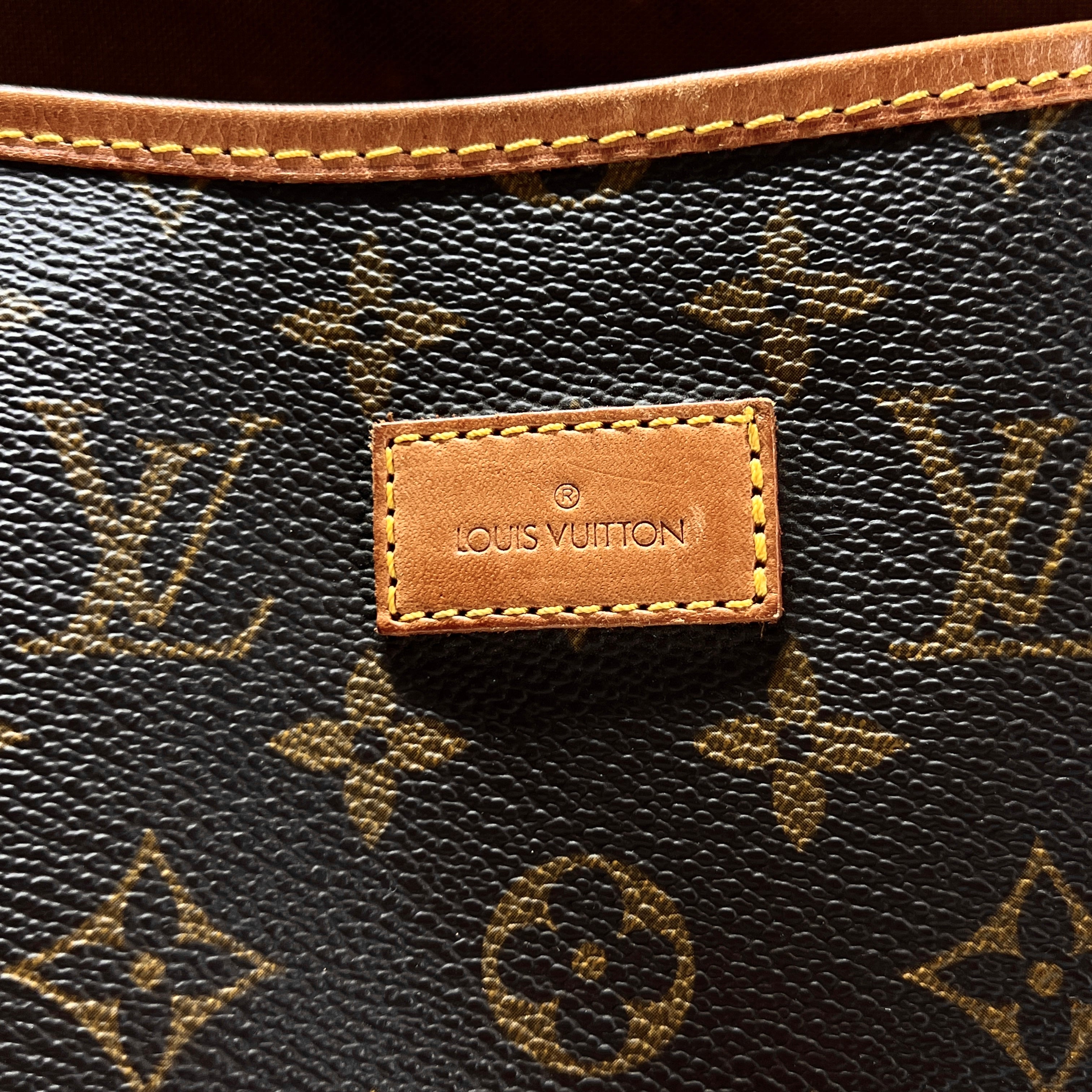 Sac à main LOUIS VUITTON Saumur 35 toile et cuir marron