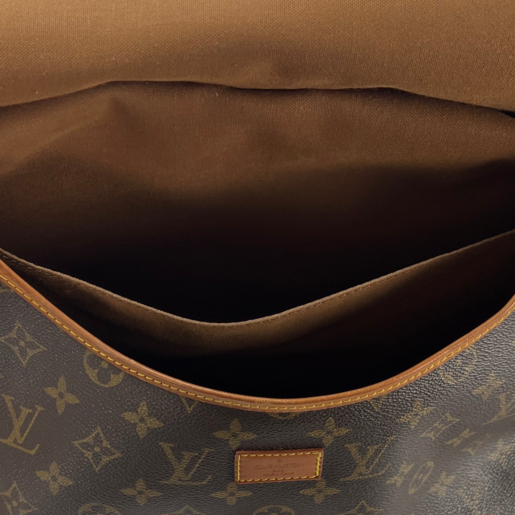 LOUIS VUITTON Saumur 35 handbag in brown canvas and leather