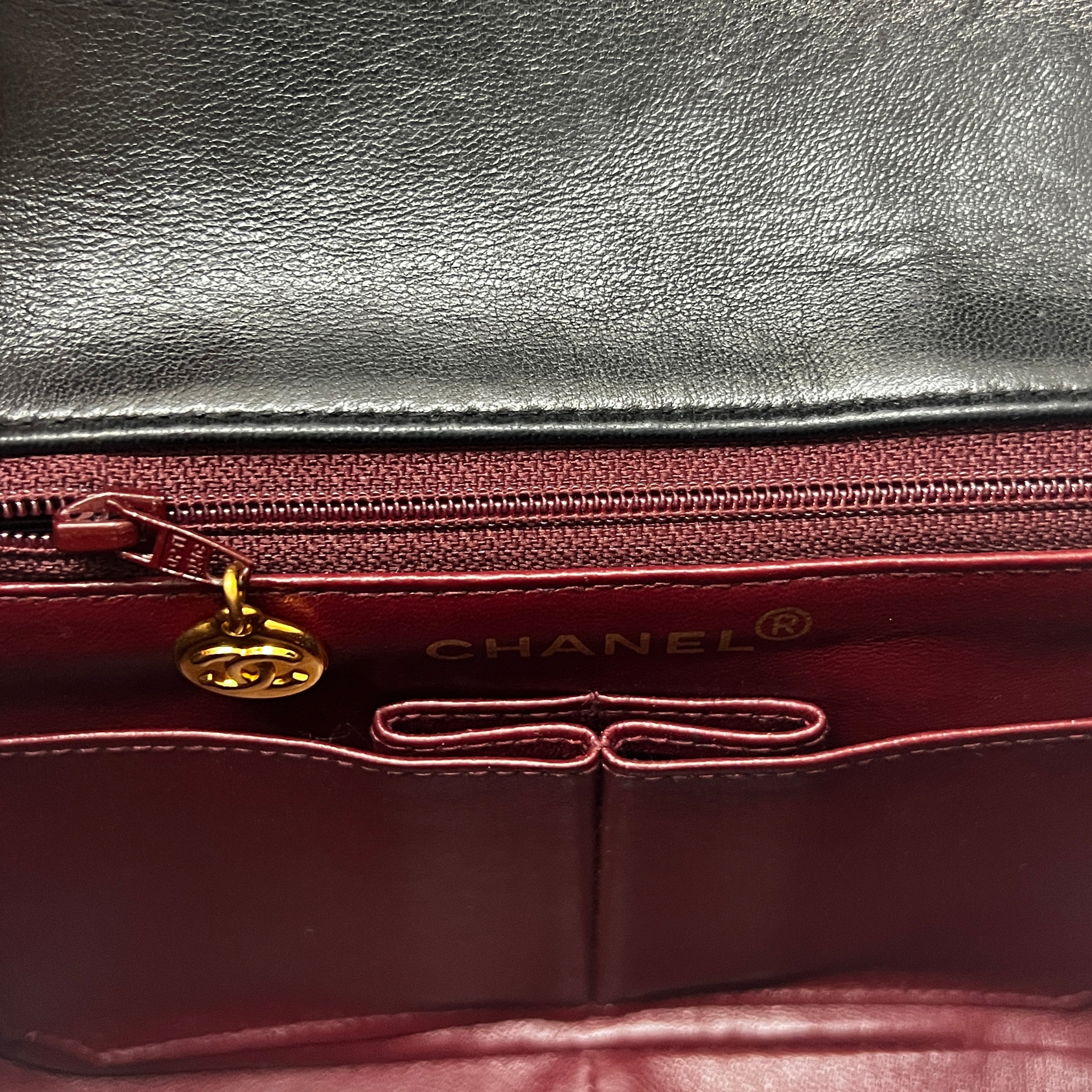 CHANEL Timeless classic mini flap black leather handbag