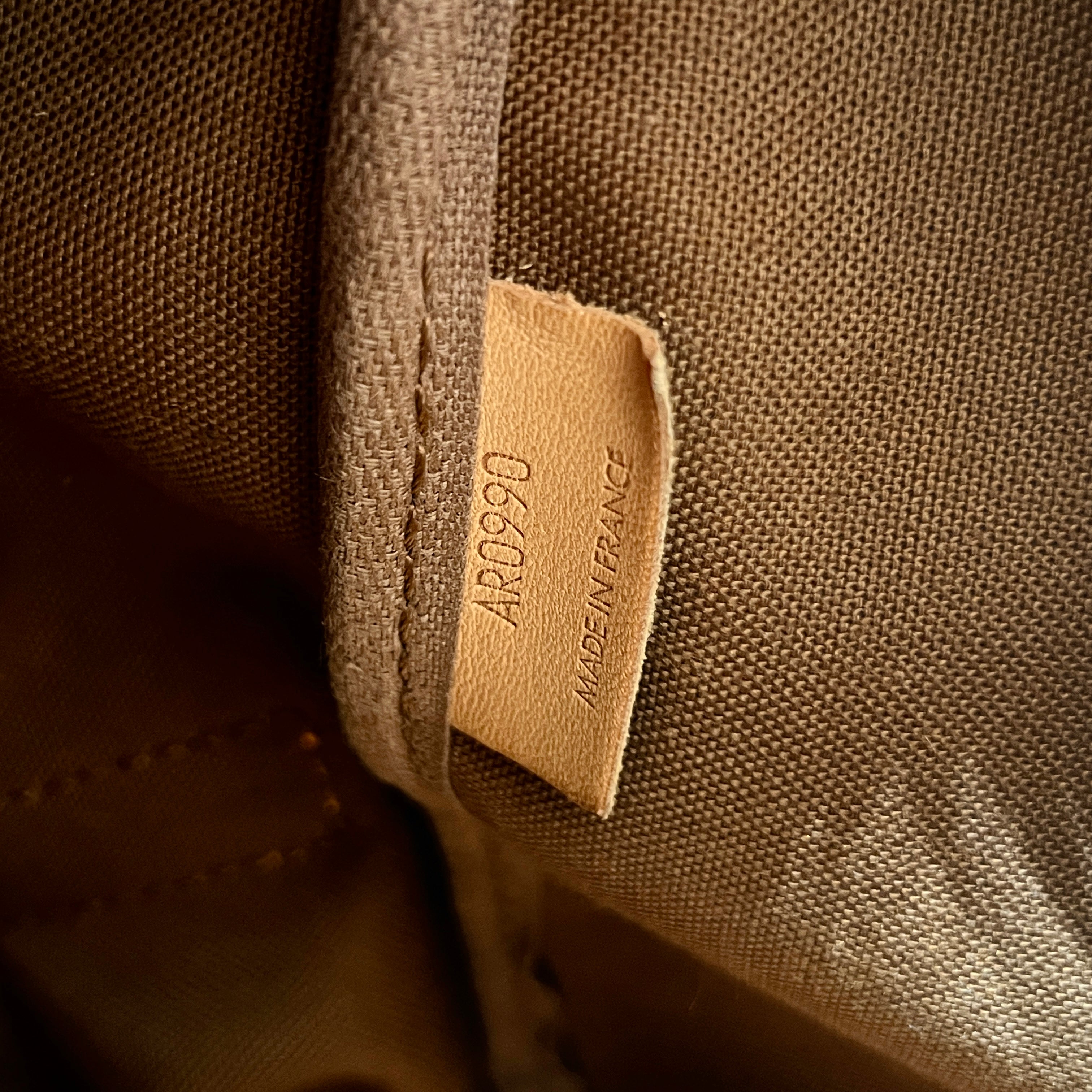 Sac à main LOUIS VUITTON Saumur 35 toile et cuir marron