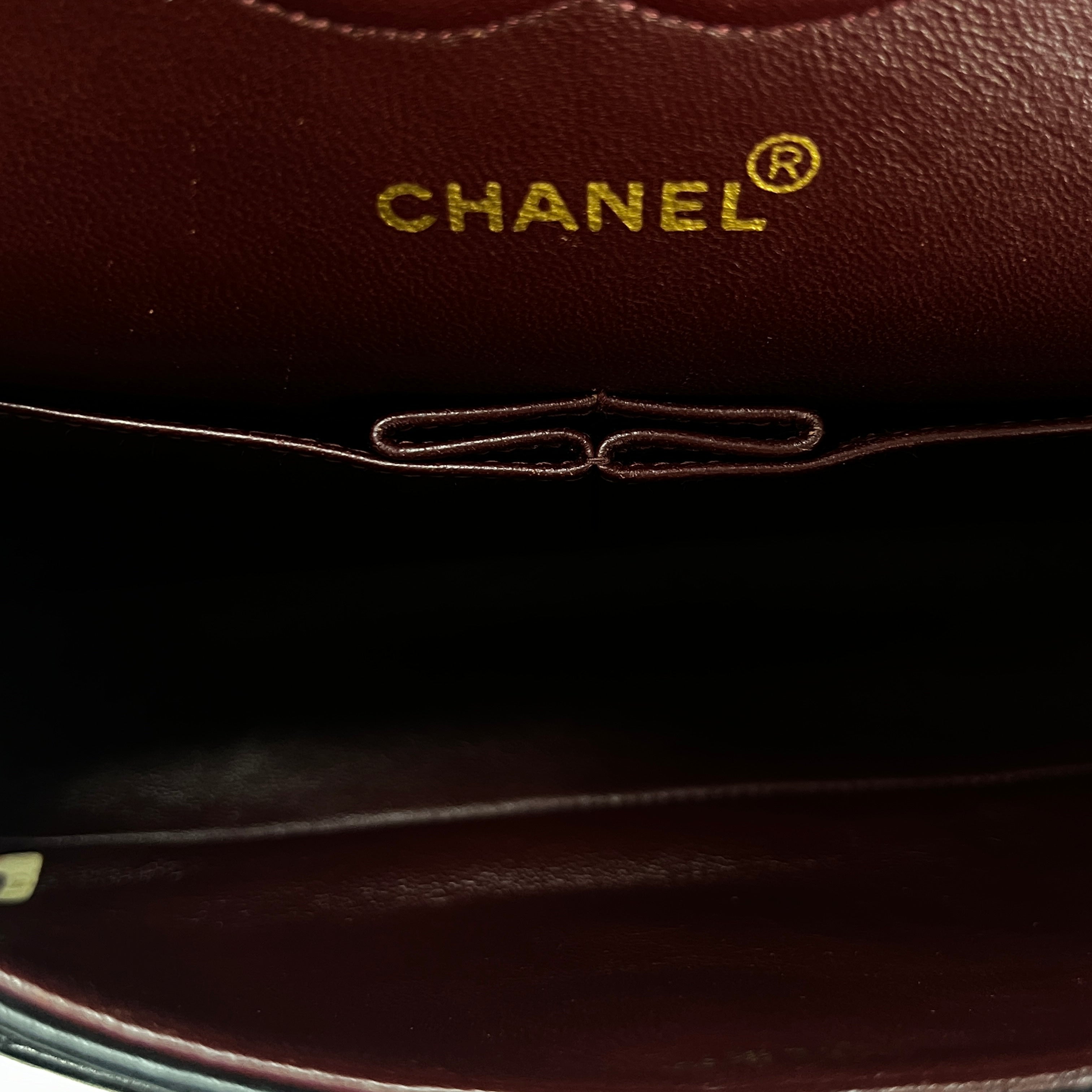 CHANEL Timeless classic medium double flap black leather handbag