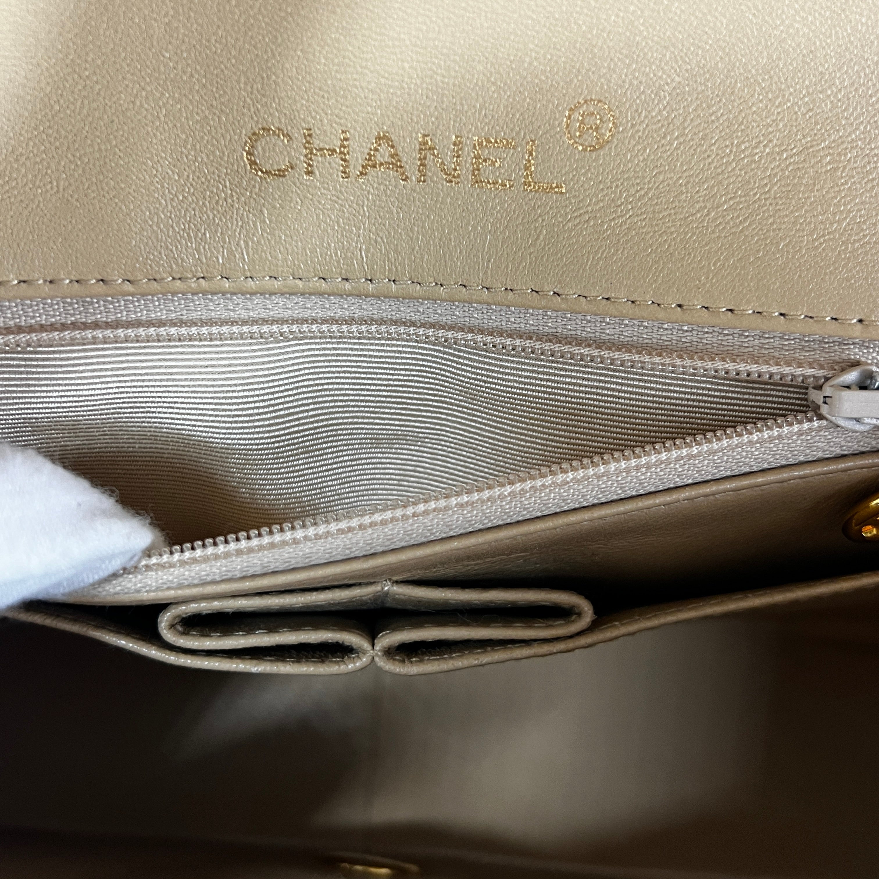 CHANEL Timeless classic quilted single flap beige leather handbag