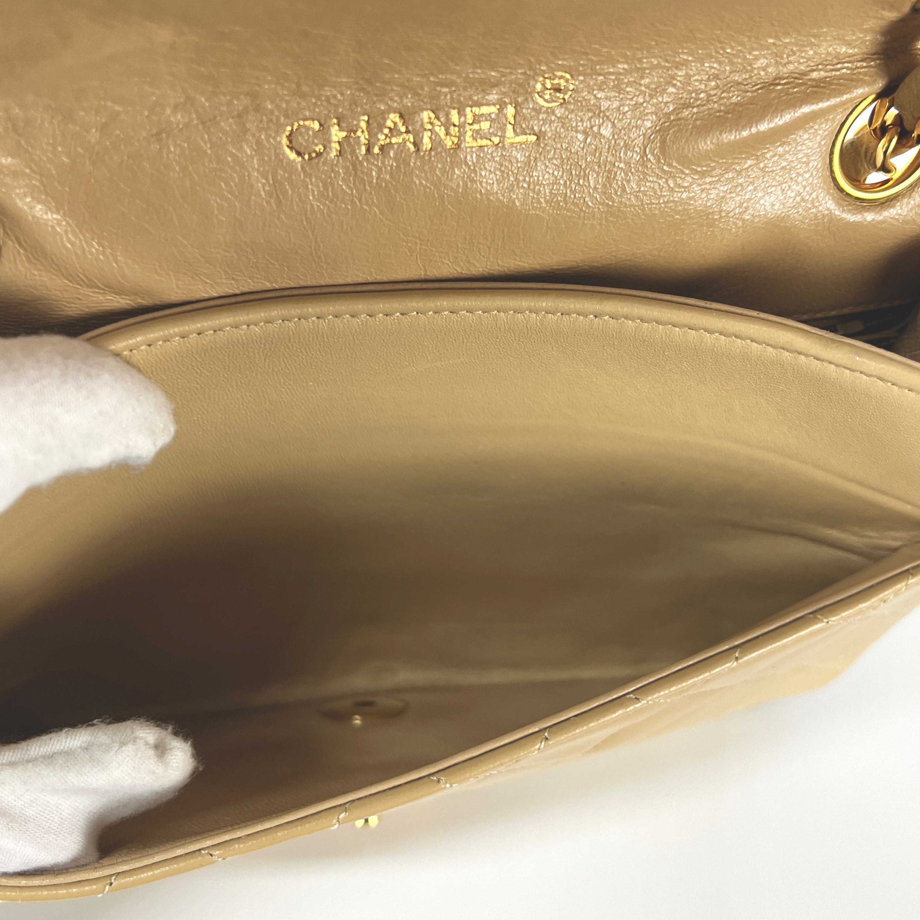 CHANEL Timeless classic quilted single flap beige leather handbag