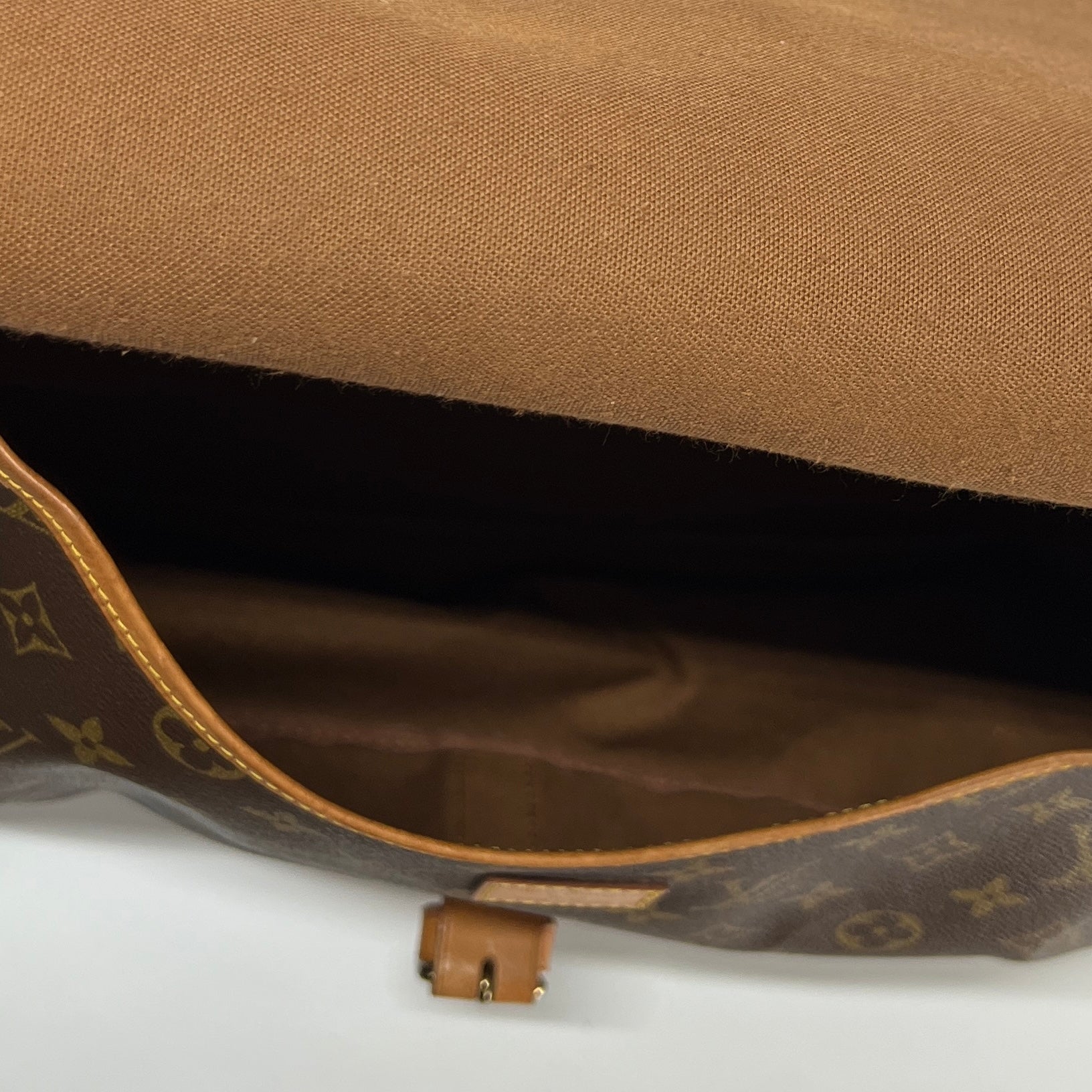 LOUIS VUITTON Saumur 30 canvas and brown leather handbag