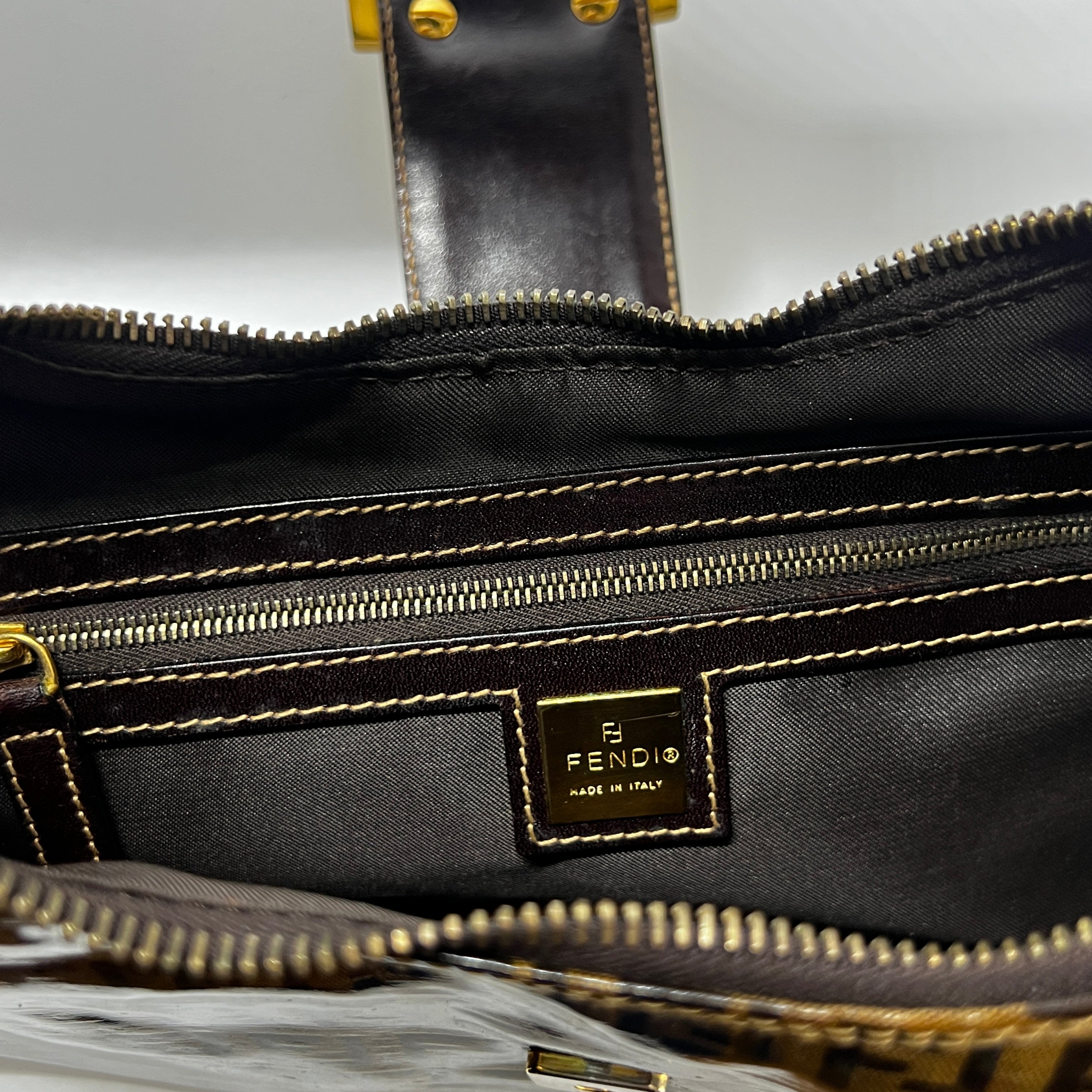 FENDI Croissant handbag in brown patent leather