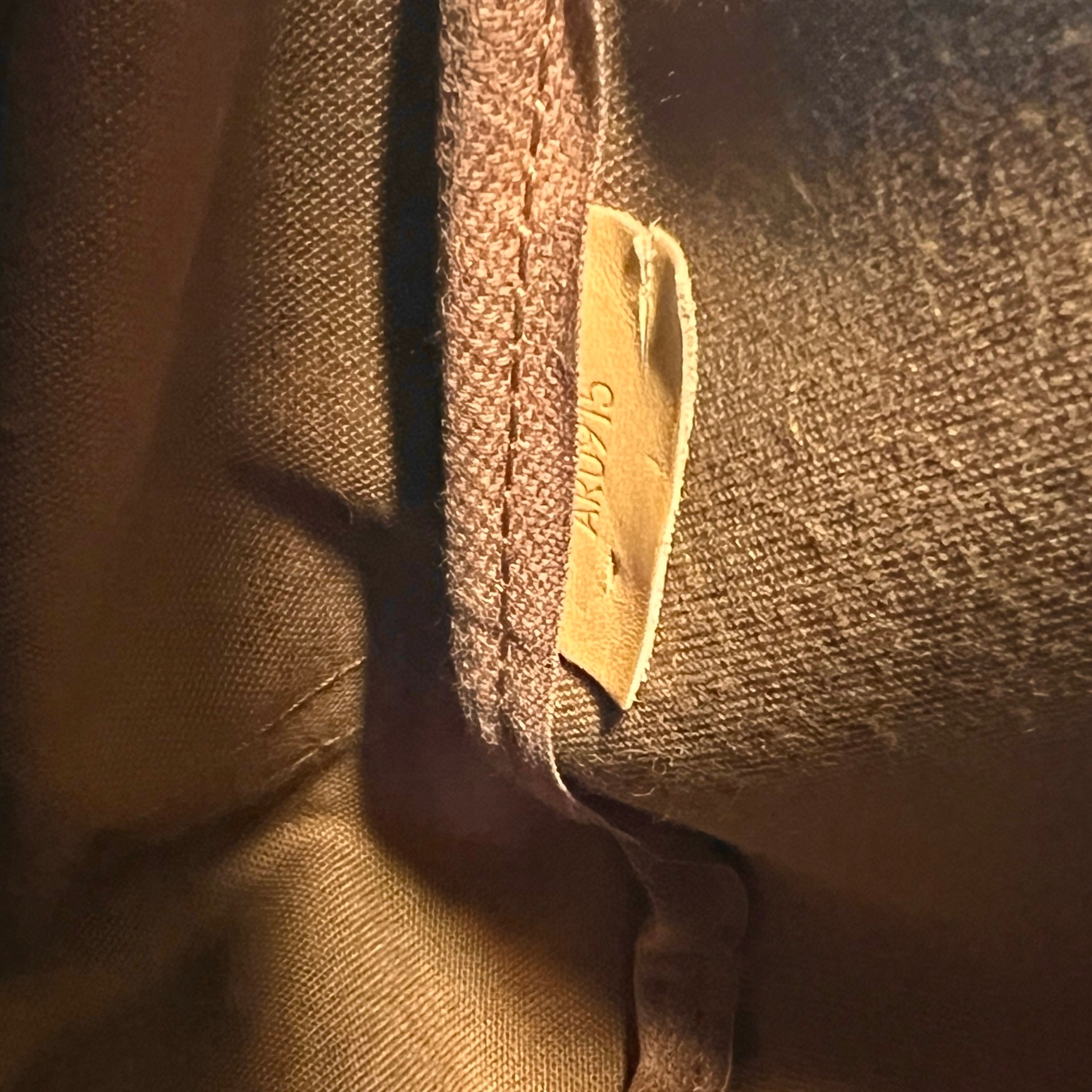 LOUIS VUITTON Saumur 30 canvas and brown leather handbag
