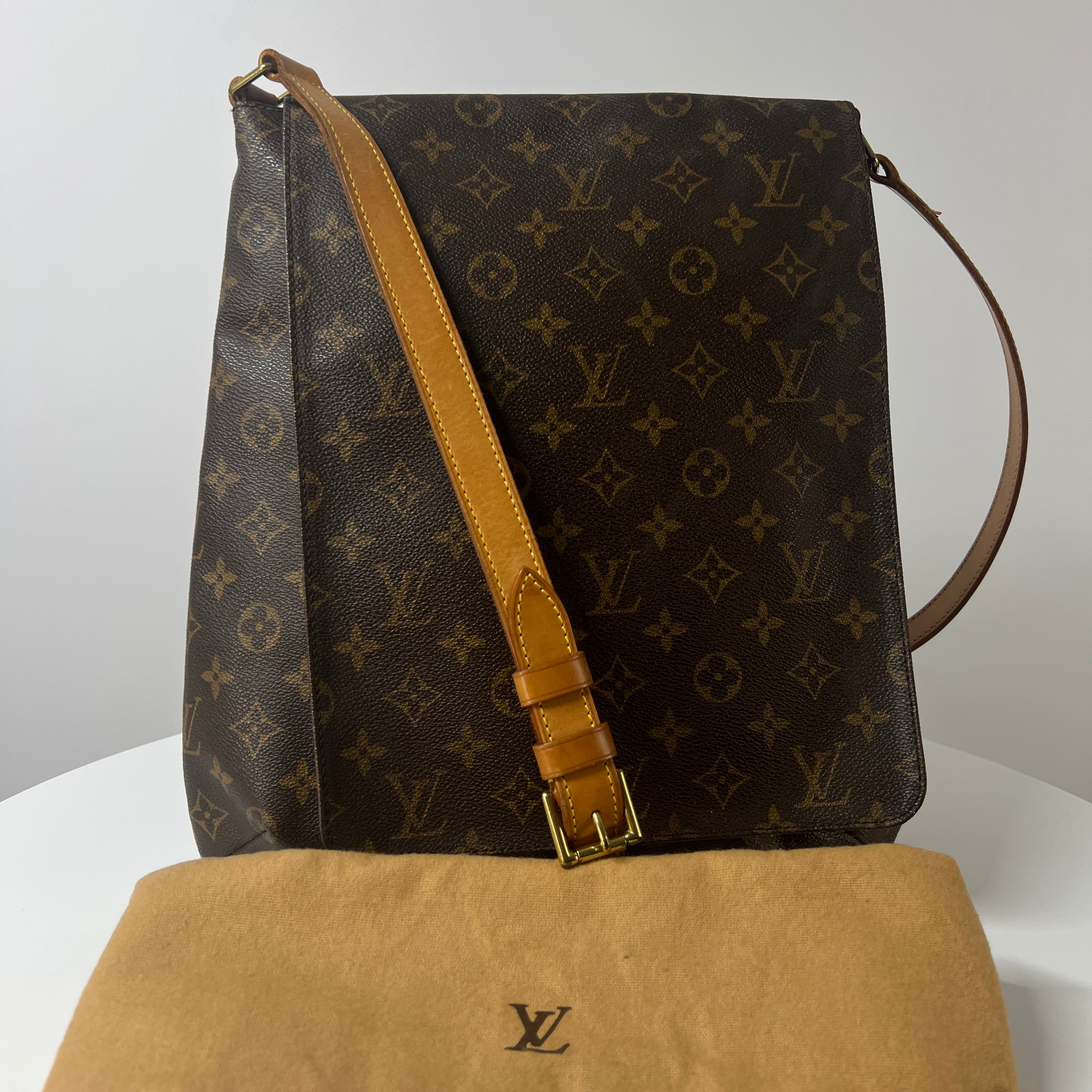 LOUIS VUITTON Tango canvas and brown leather handbag
