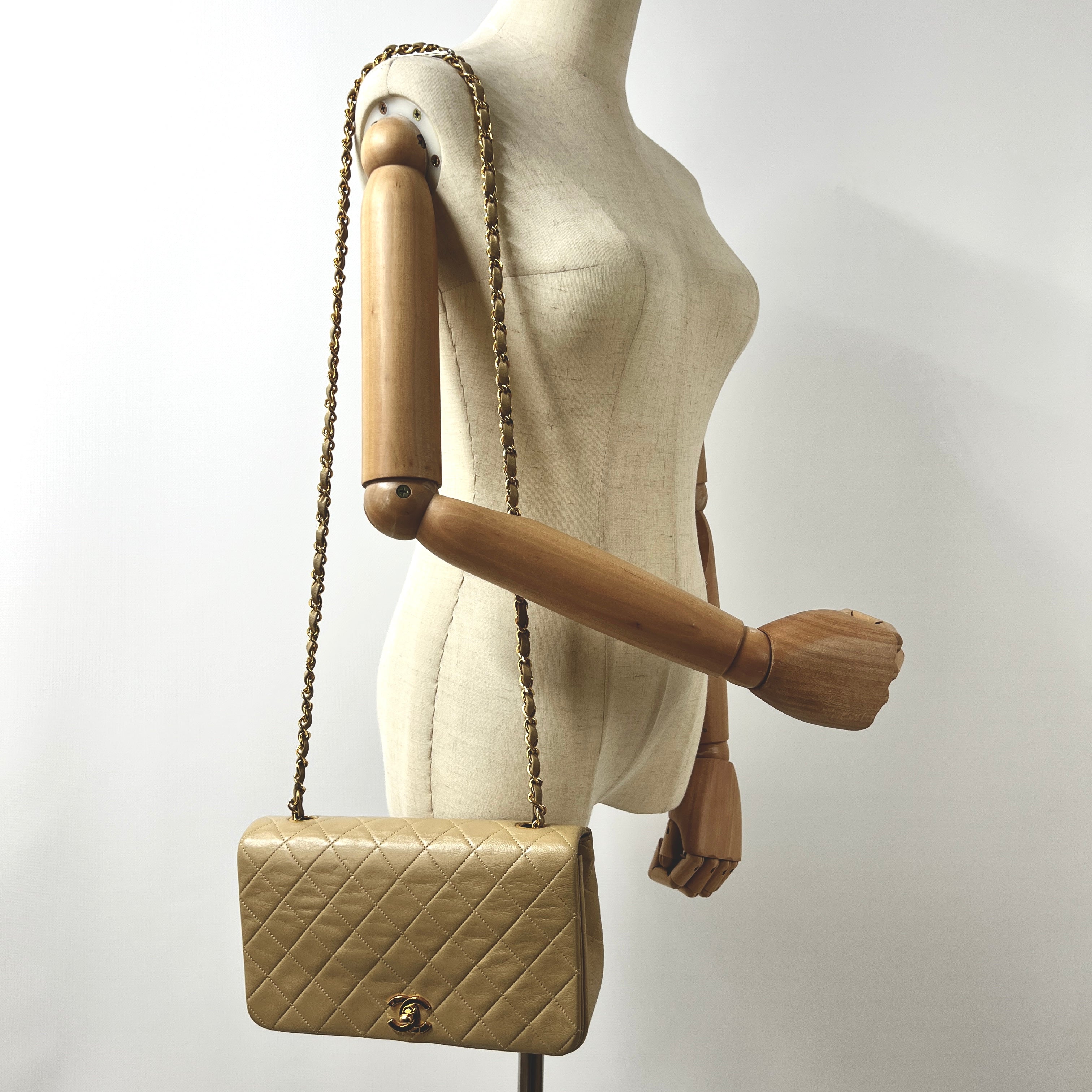 CHANEL Timeless classic quilted single flap beige leather handbag
