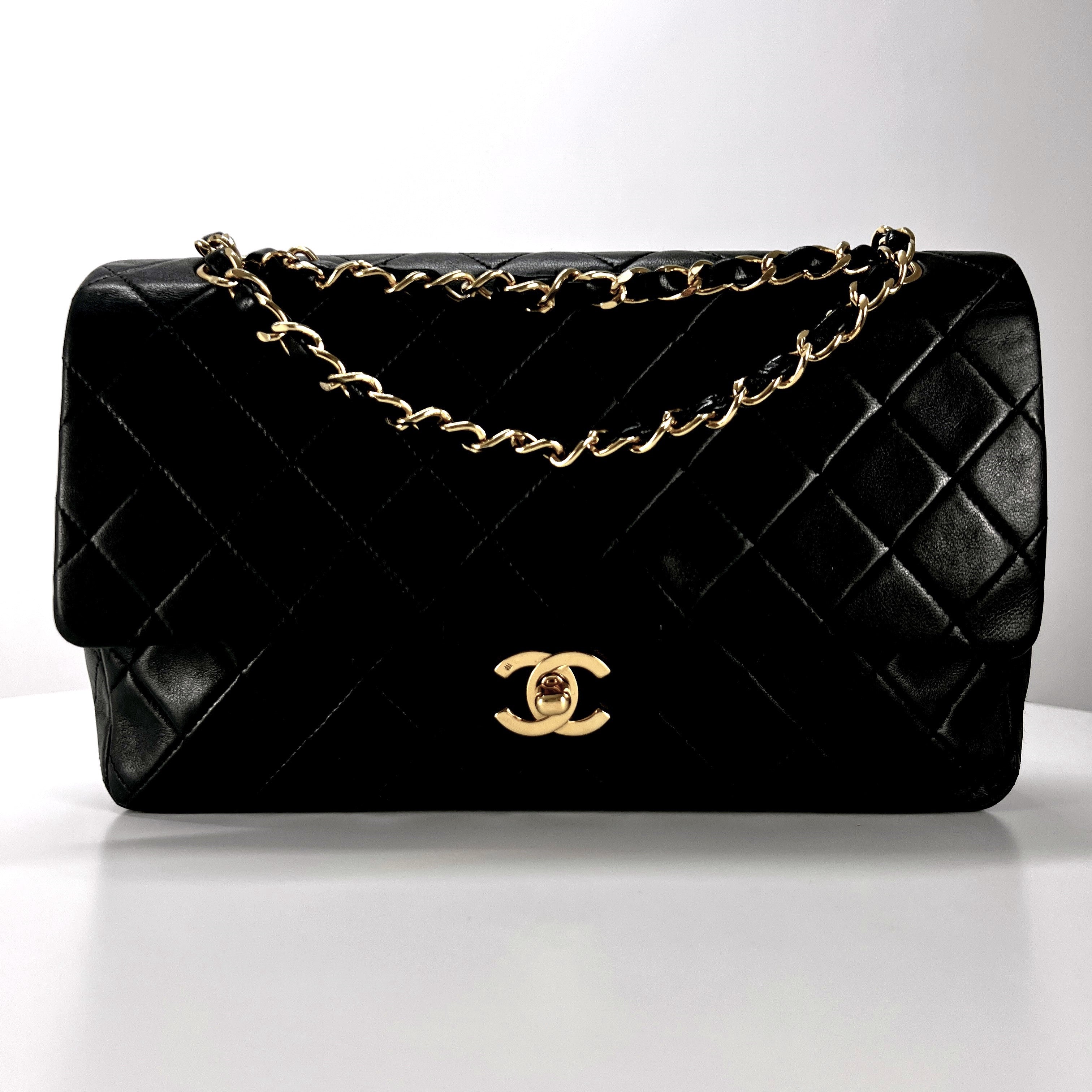 CHANEL Timeless classic medium double flap black leather handbag