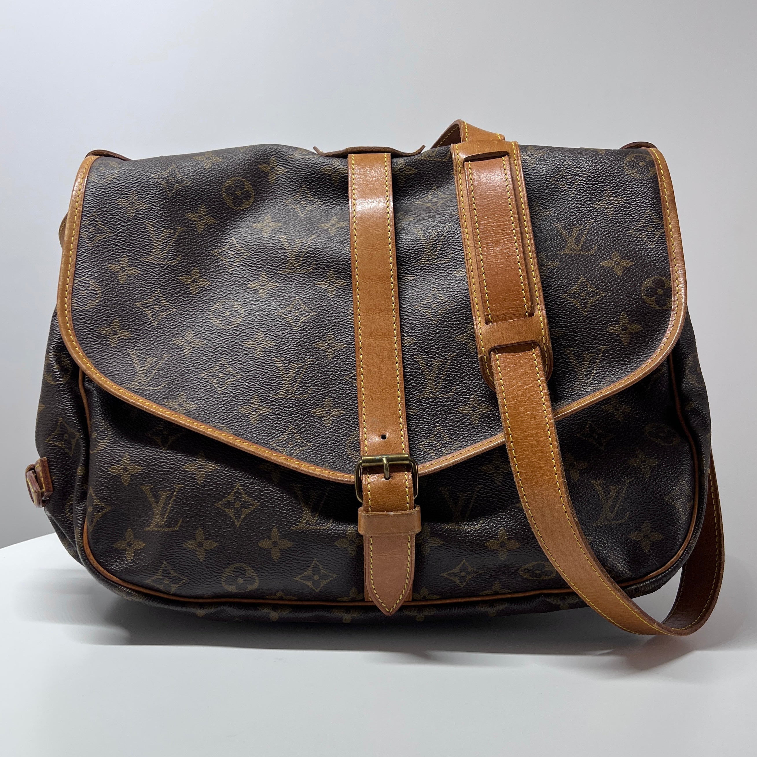 Sac à main LOUIS VUITTON Saumur 35 toile et cuir marron