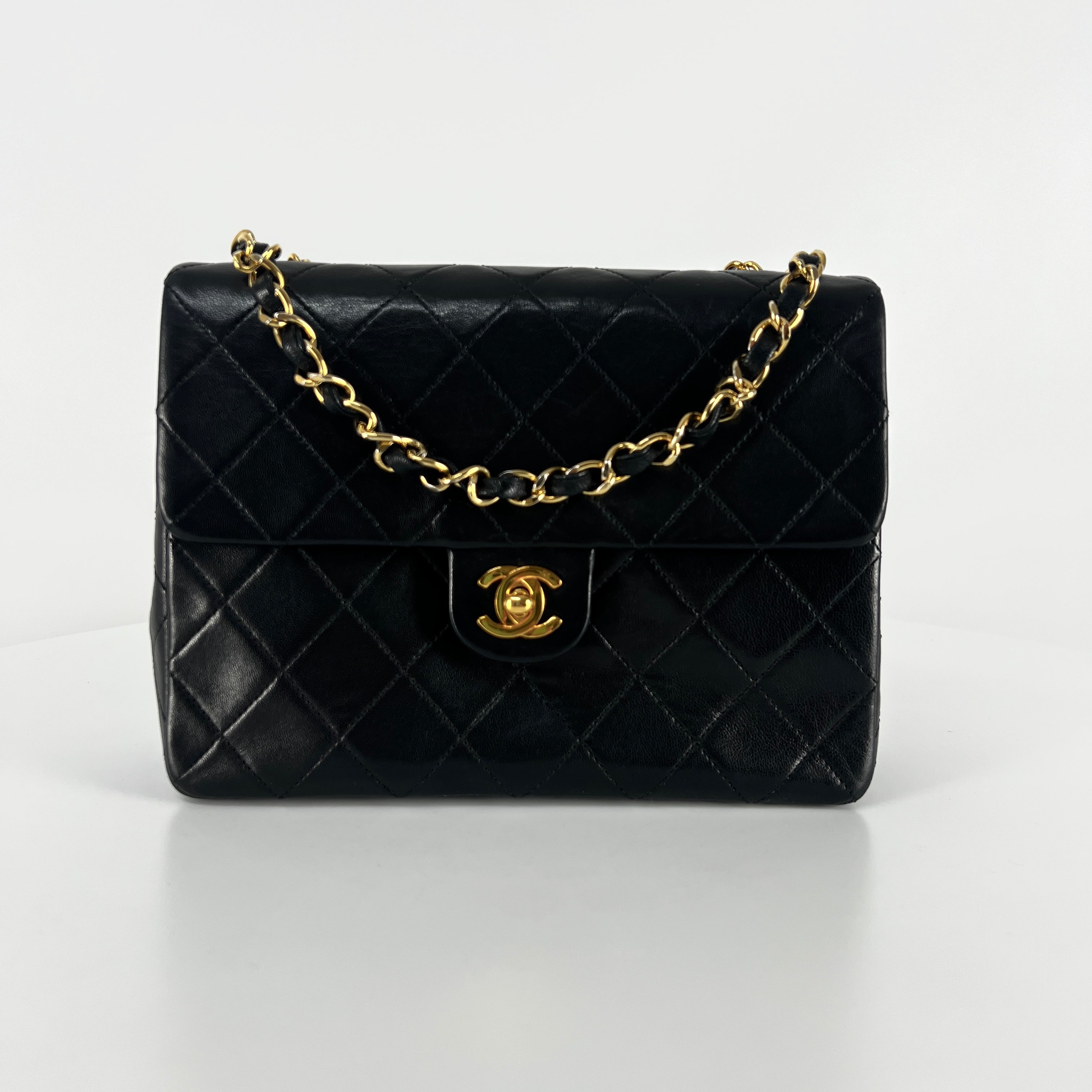 CHANEL Timeless classic mini flap black leather handbag