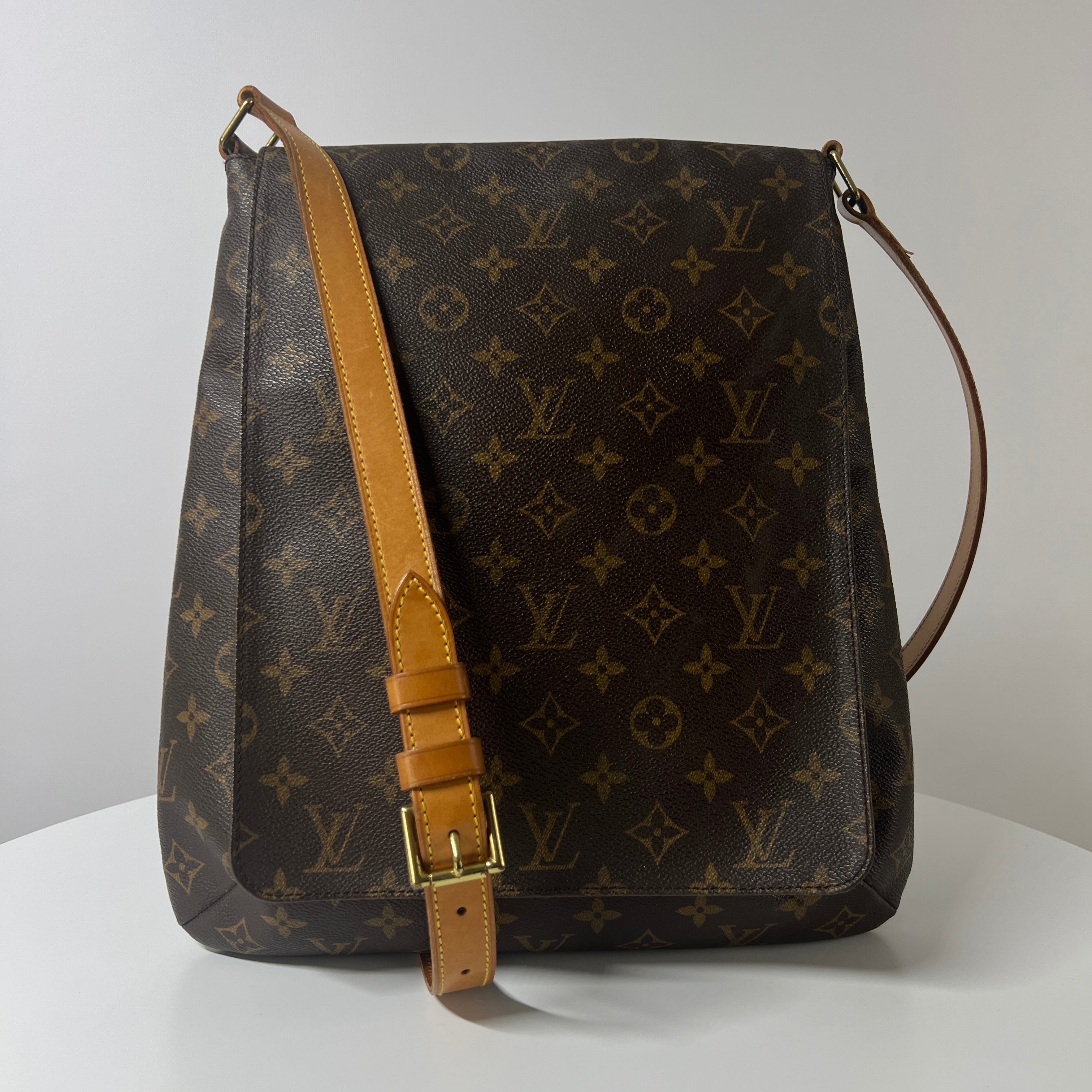 LOUIS VUITTON Tango canvas and brown leather handbag