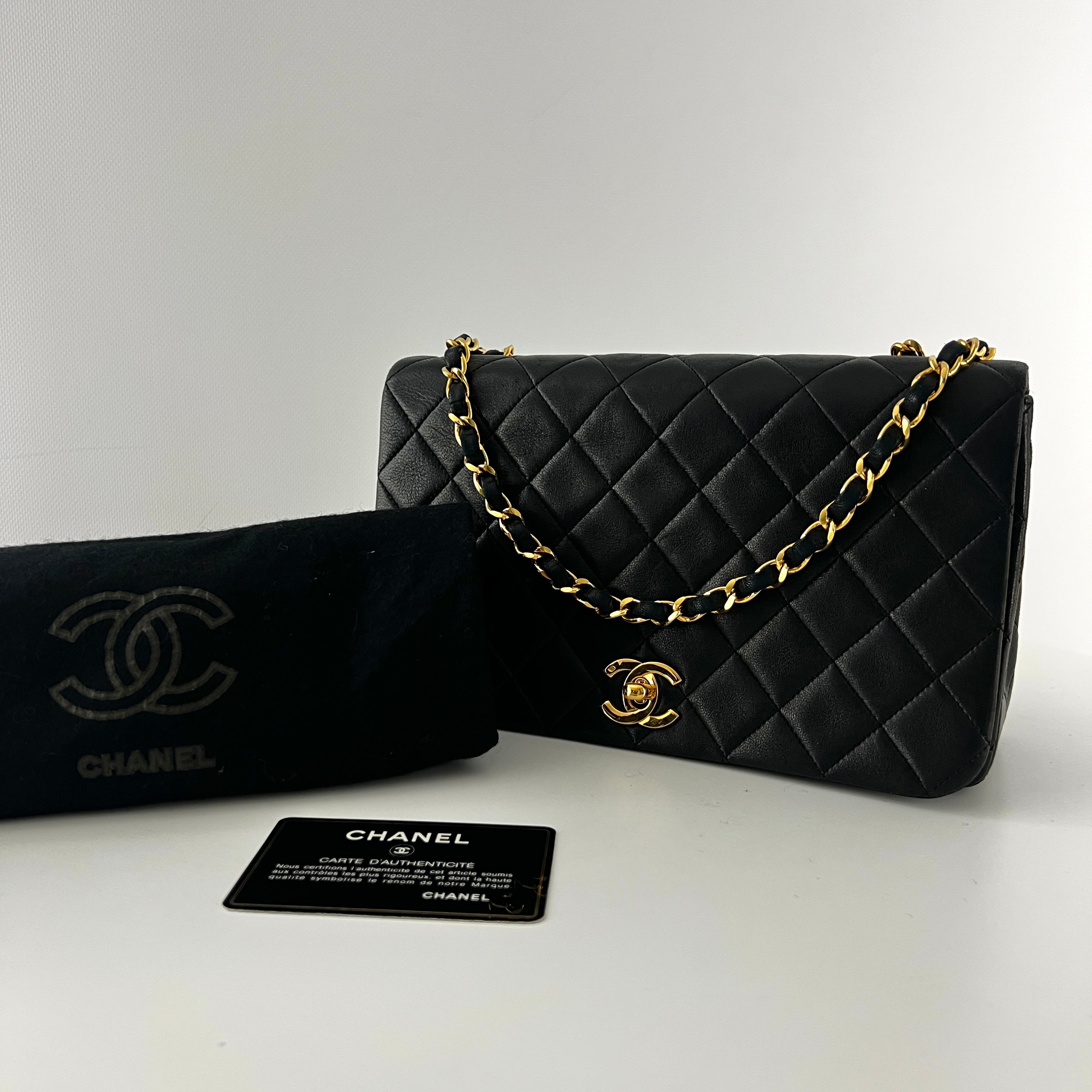 CHANEL Timeless classic quilted single flap black leather handbag