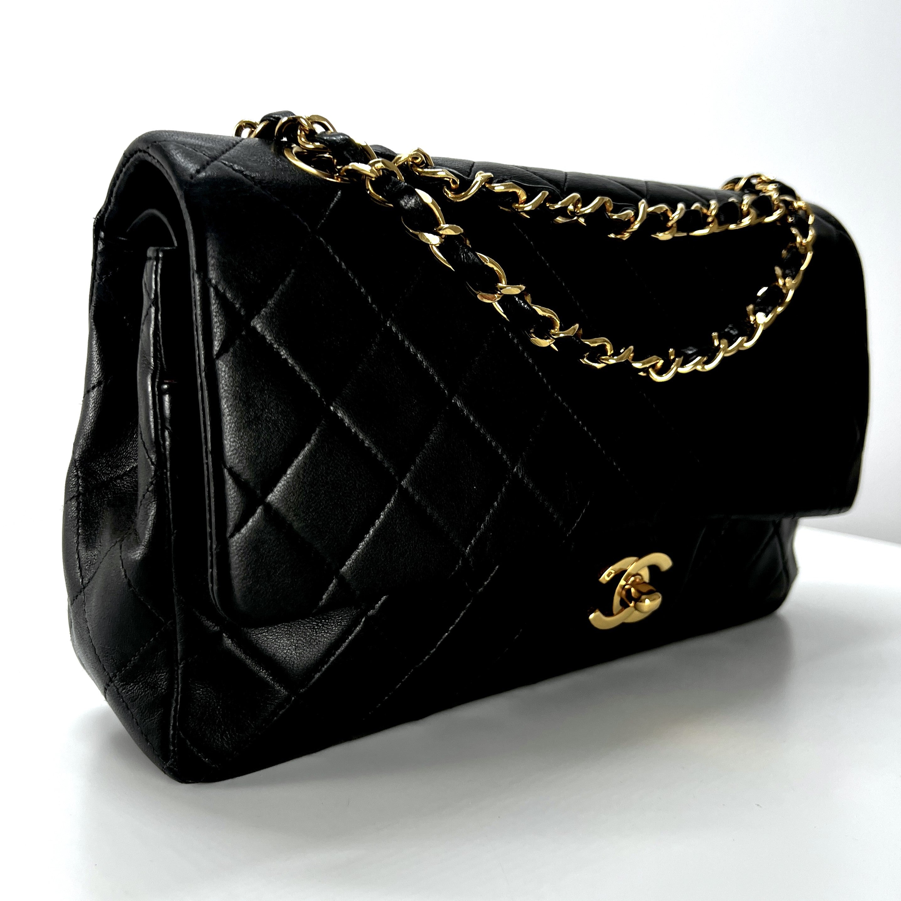 CHANEL Timeless classic medium double flap black leather handbag