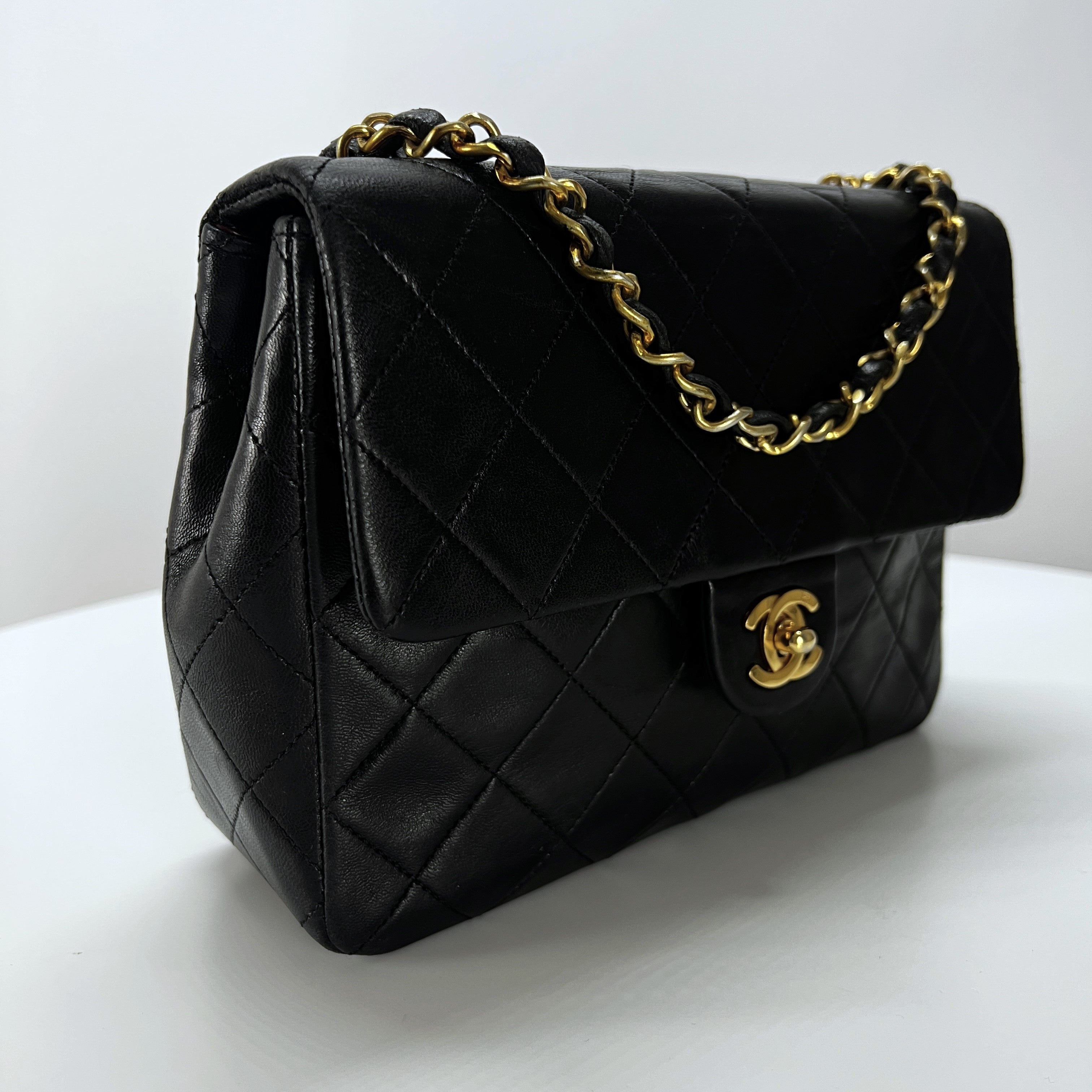 CHANEL Timeless classic mini flap black leather handbag