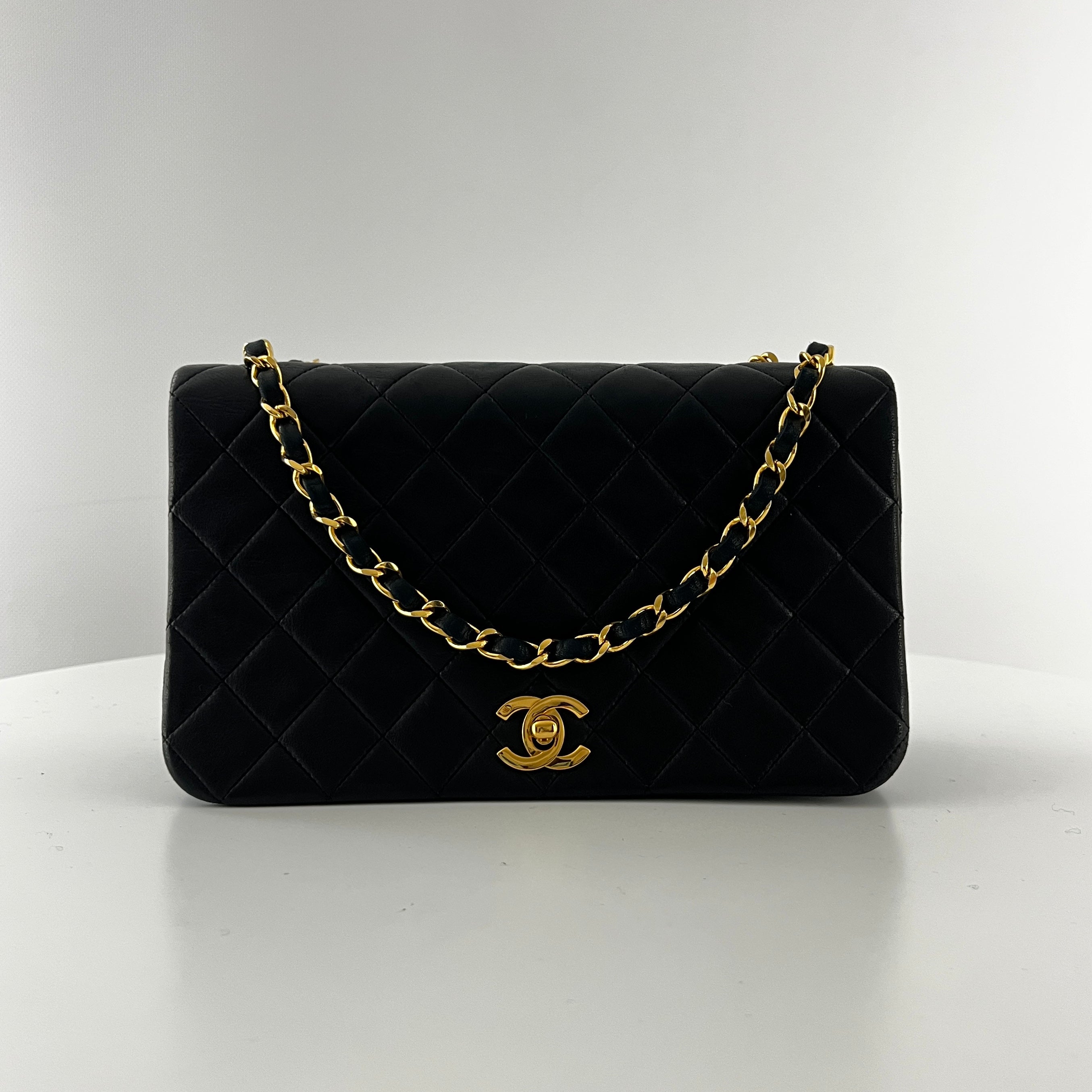 CHANEL Timeless classic quilted single flap black leather handbag