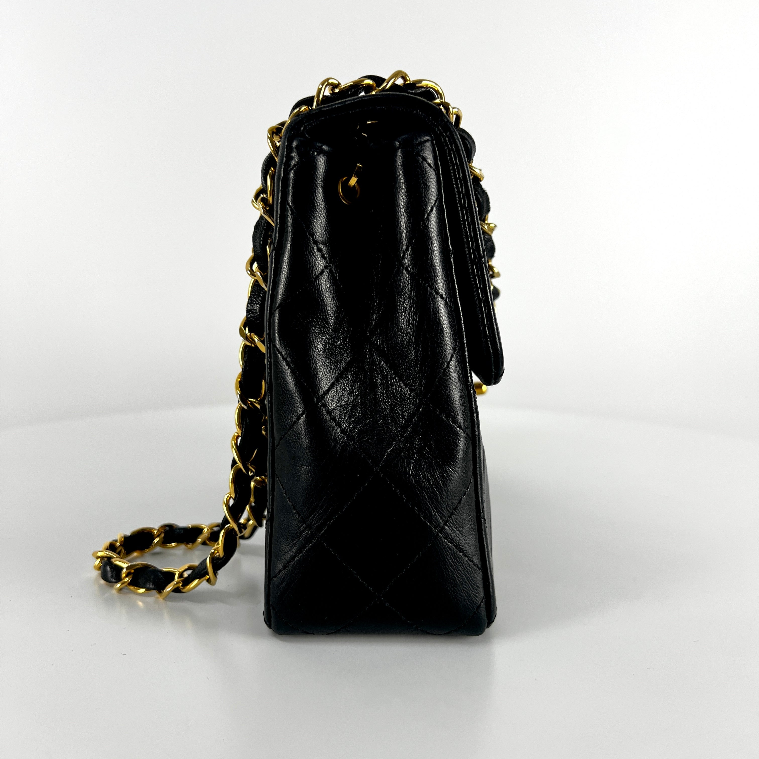 CHANEL Timeless classic mini flap black leather handbag