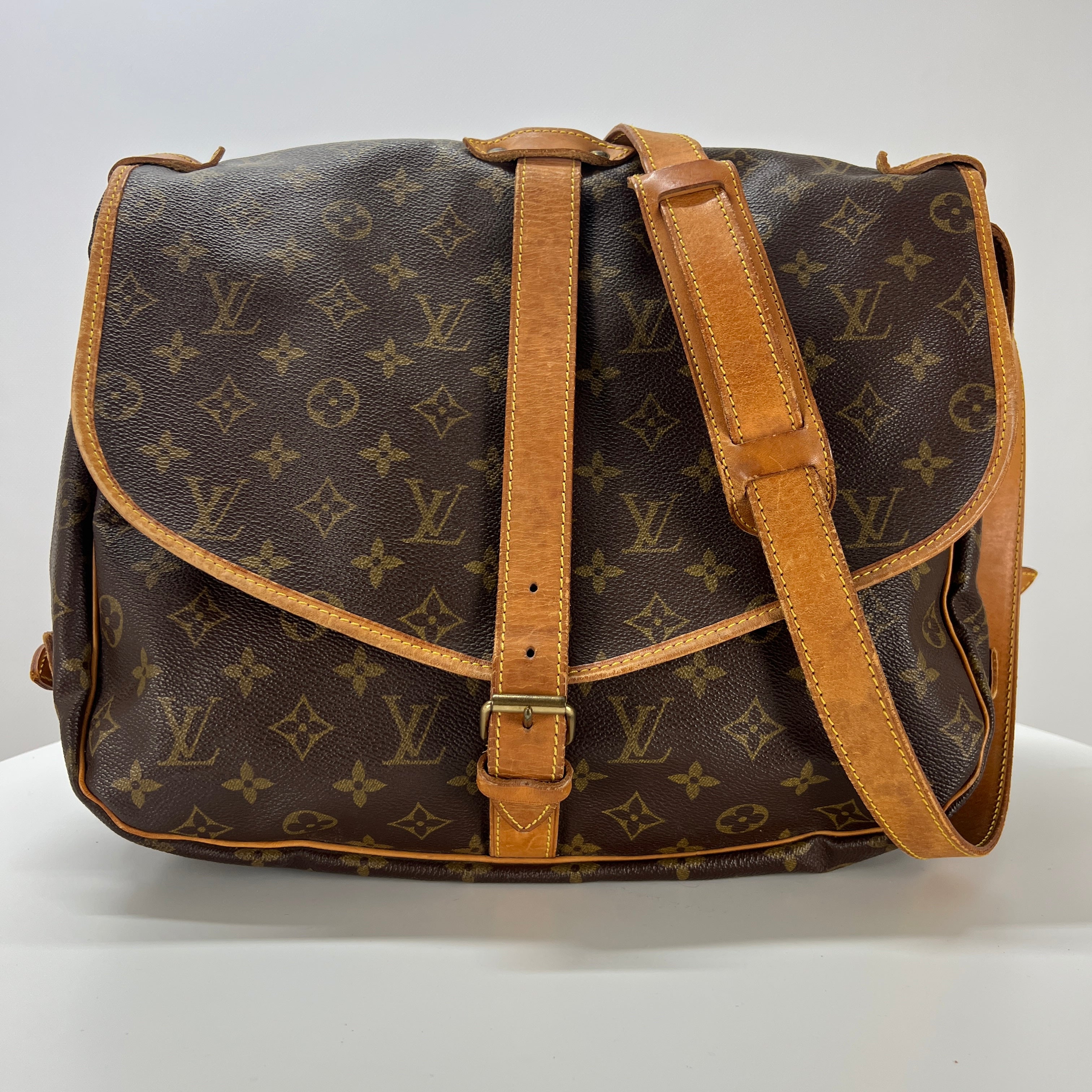 LOUIS VUITTON Saumur 30 canvas and brown leather handbag