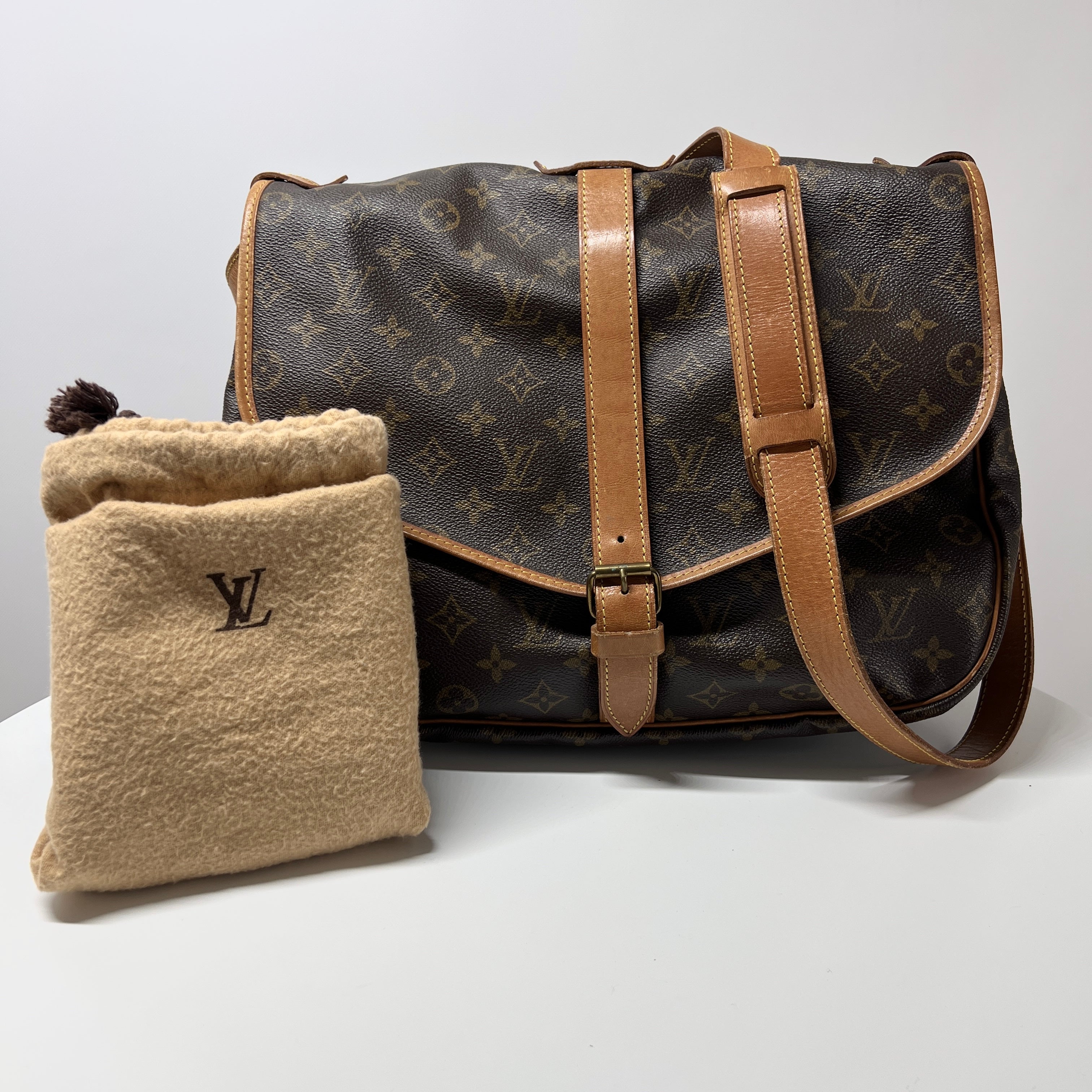 Sac à main LOUIS VUITTON Saumur 35 toile et cuir marron