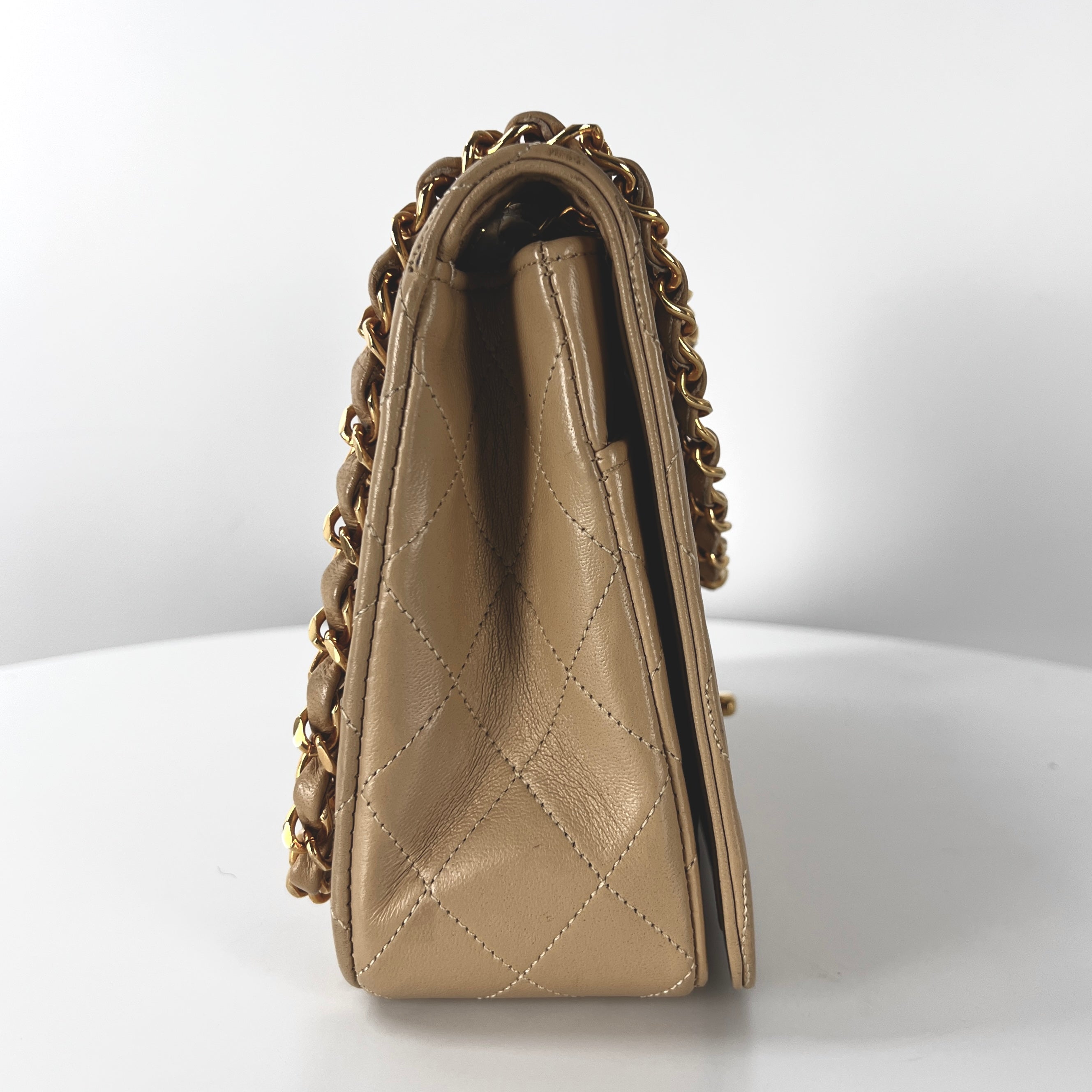 CHANEL Timeless classic quilted single flap beige leather handbag