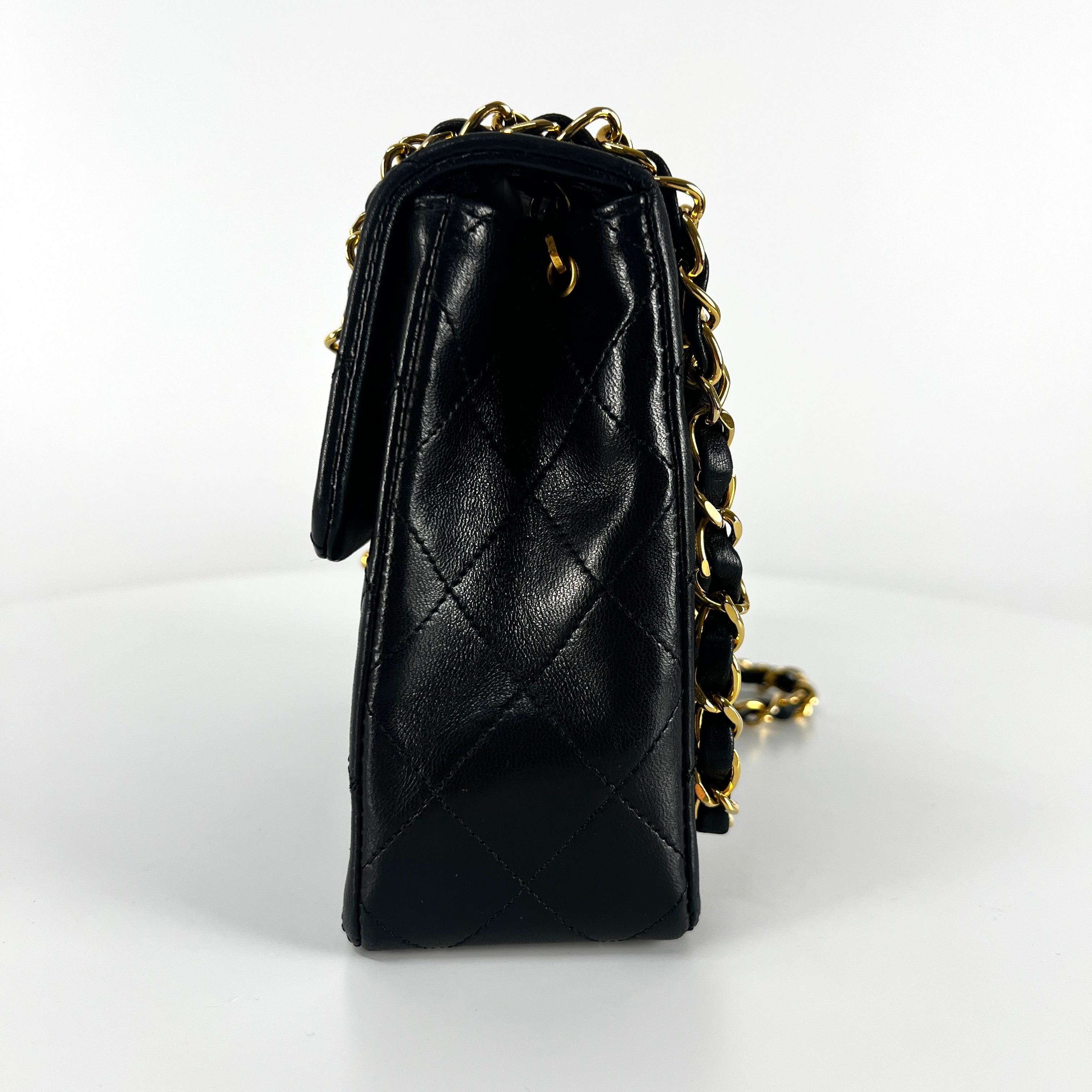CHANEL Timeless classic mini flap black leather handbag