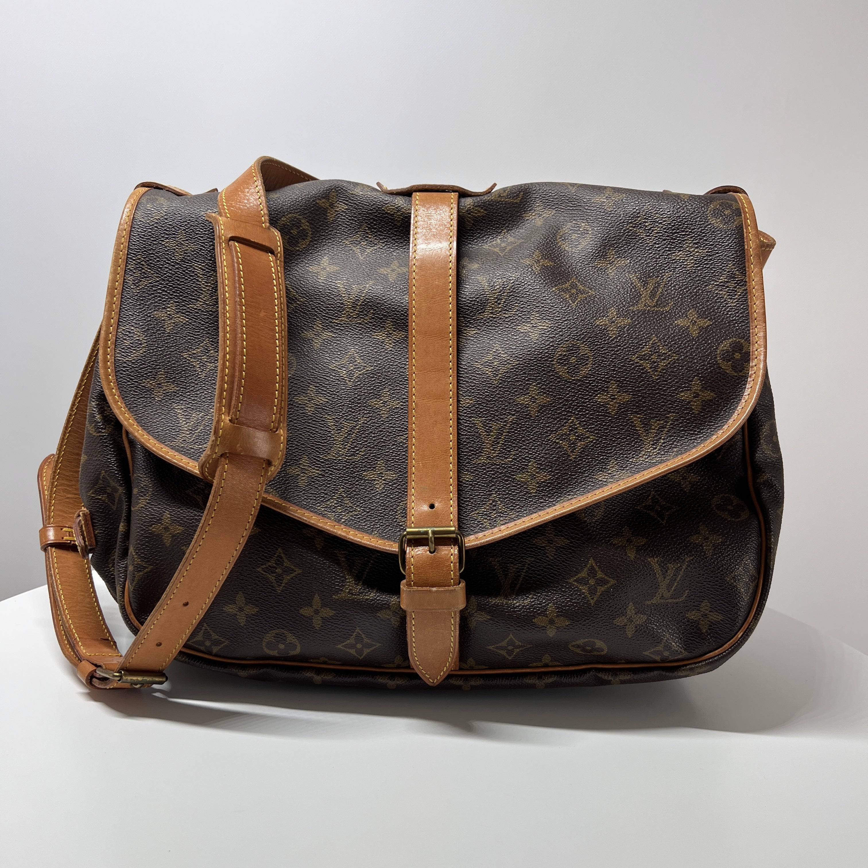 Sac à main LOUIS VUITTON Saumur 35 toile et cuir marron