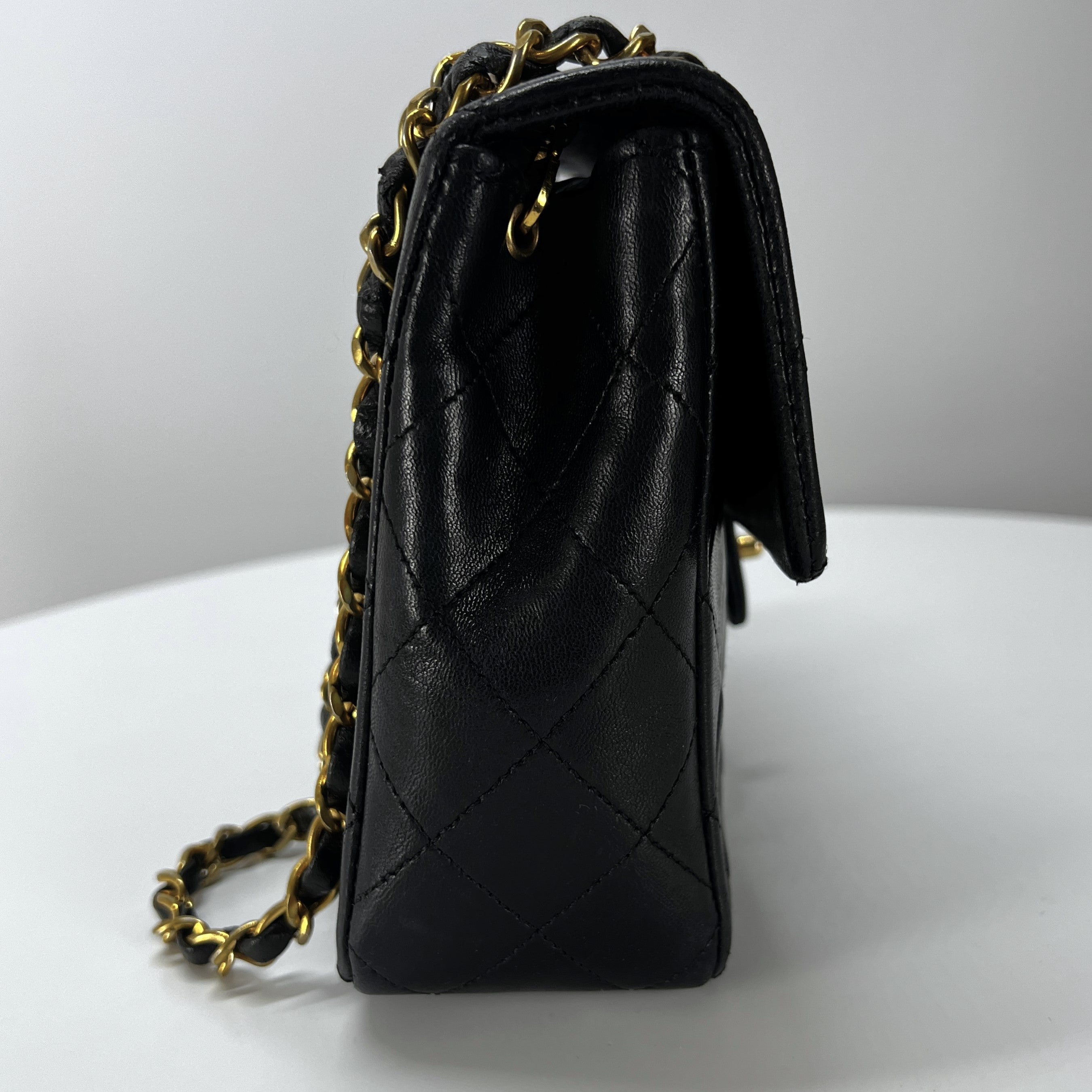 CHANEL Timeless classic mini flap black leather handbag