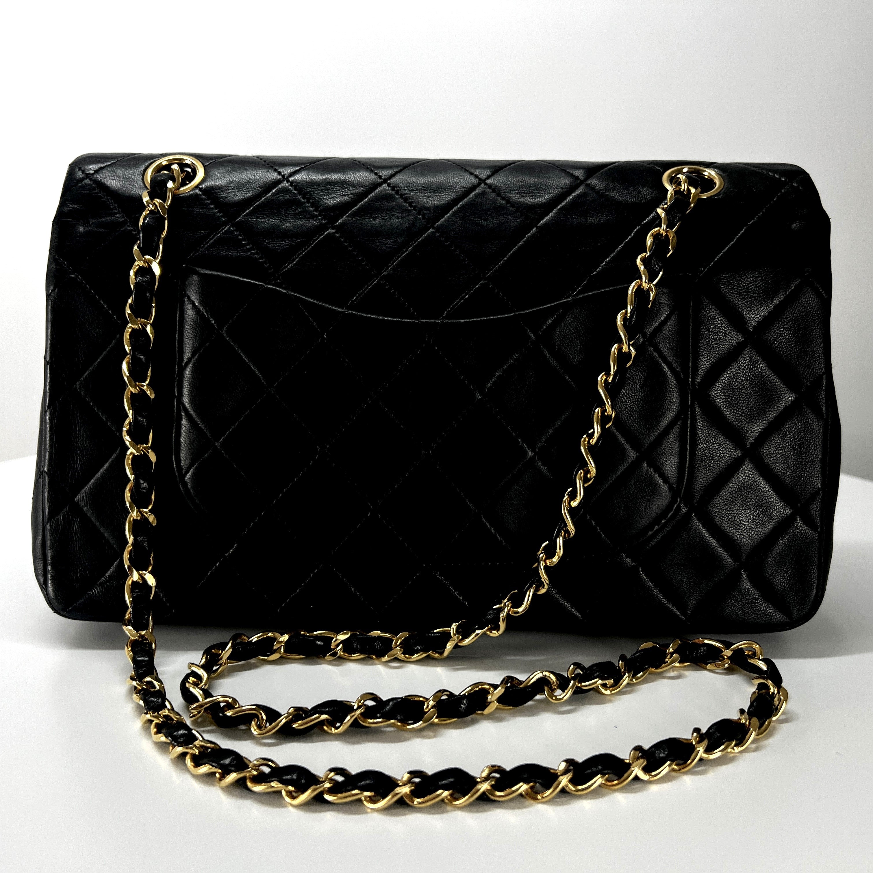 CHANEL Timeless classic medium double flap black leather handbag