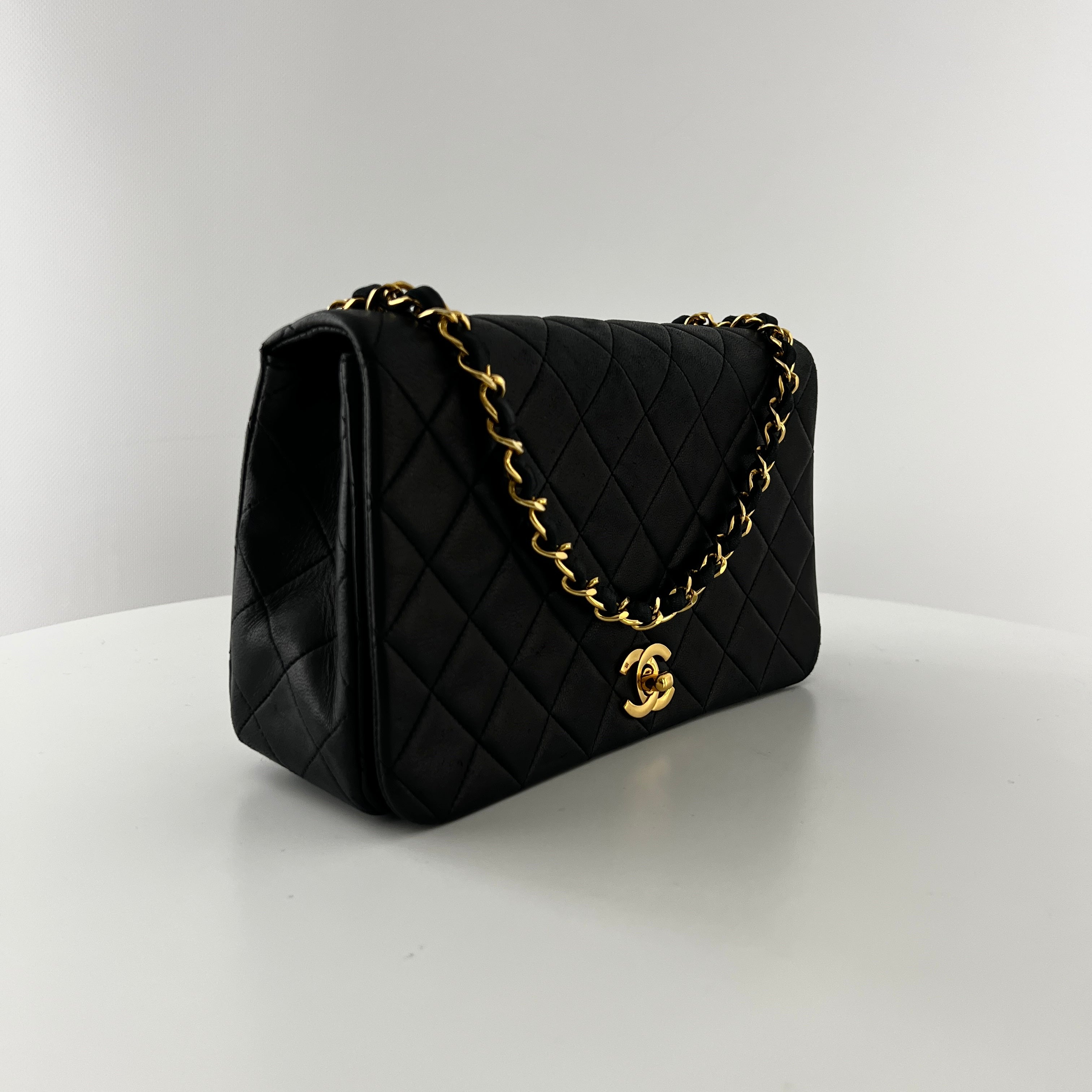 CHANEL Timeless classic quilted single flap black leather handbag