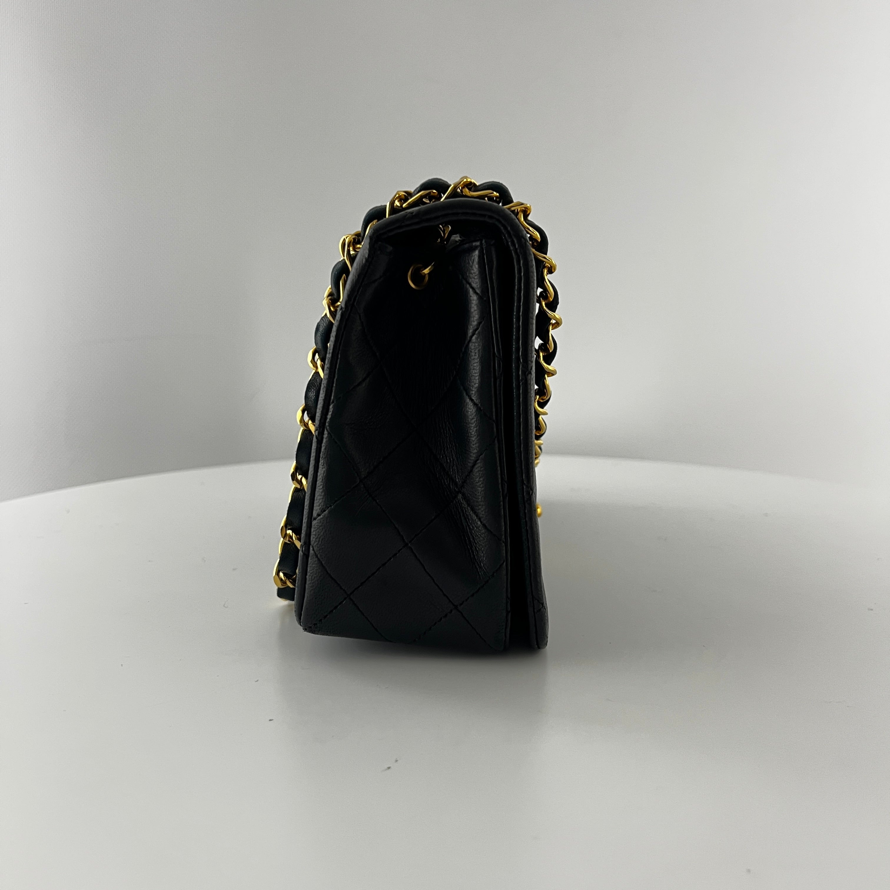 CHANEL Timeless classic quilted single flap black leather handbag