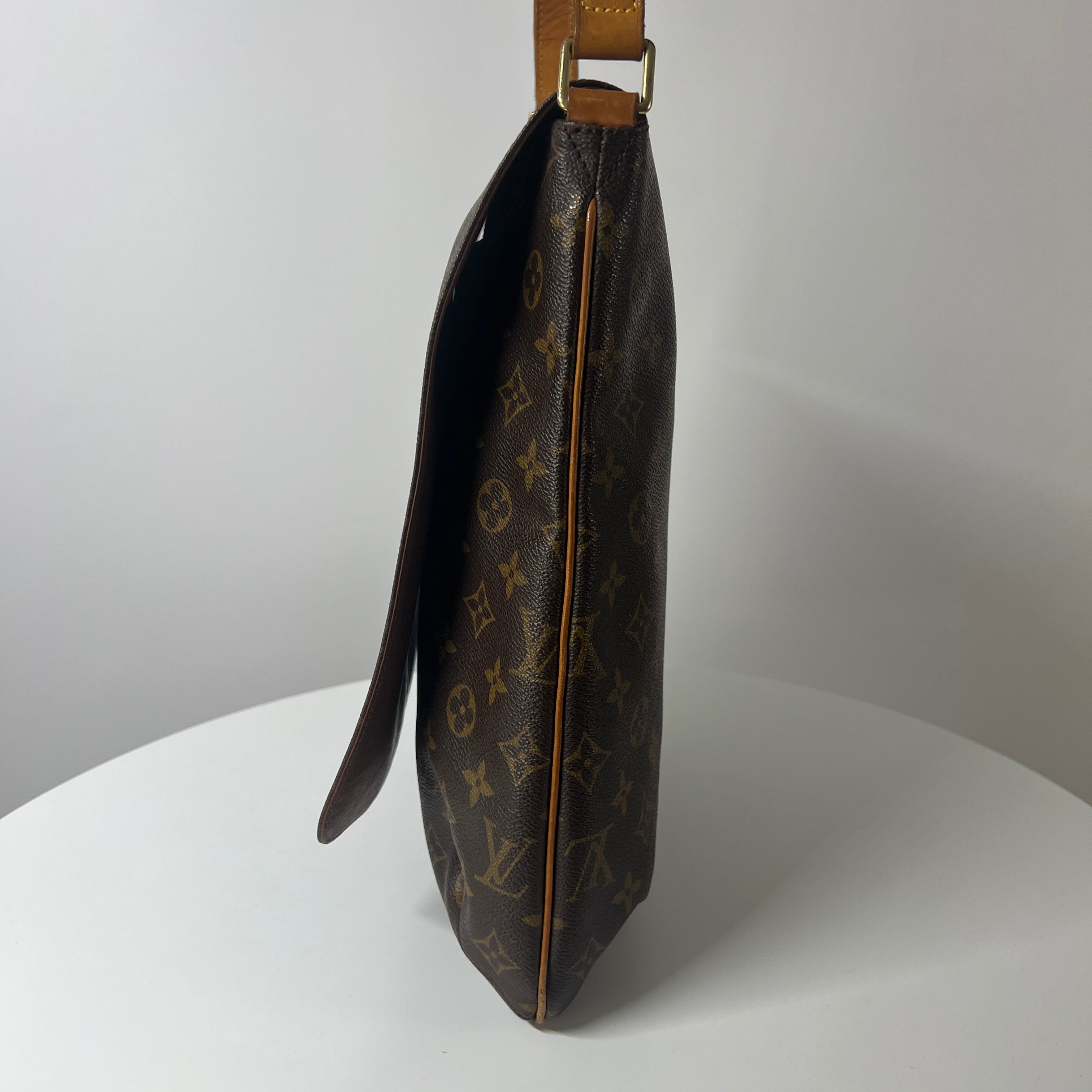 LOUIS VUITTON Tango canvas and brown leather handbag