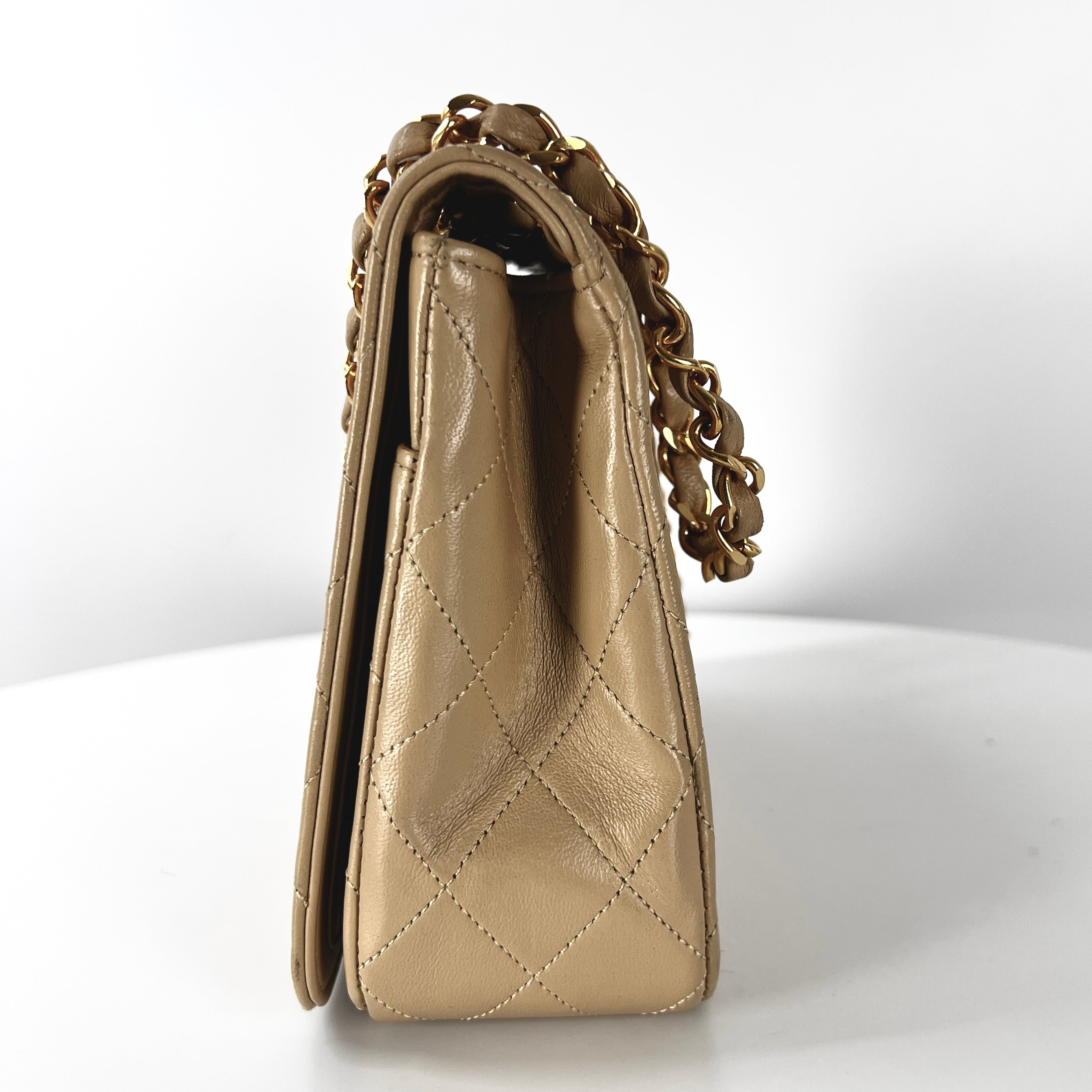 CHANEL Timeless classic quilted single flap beige leather handbag