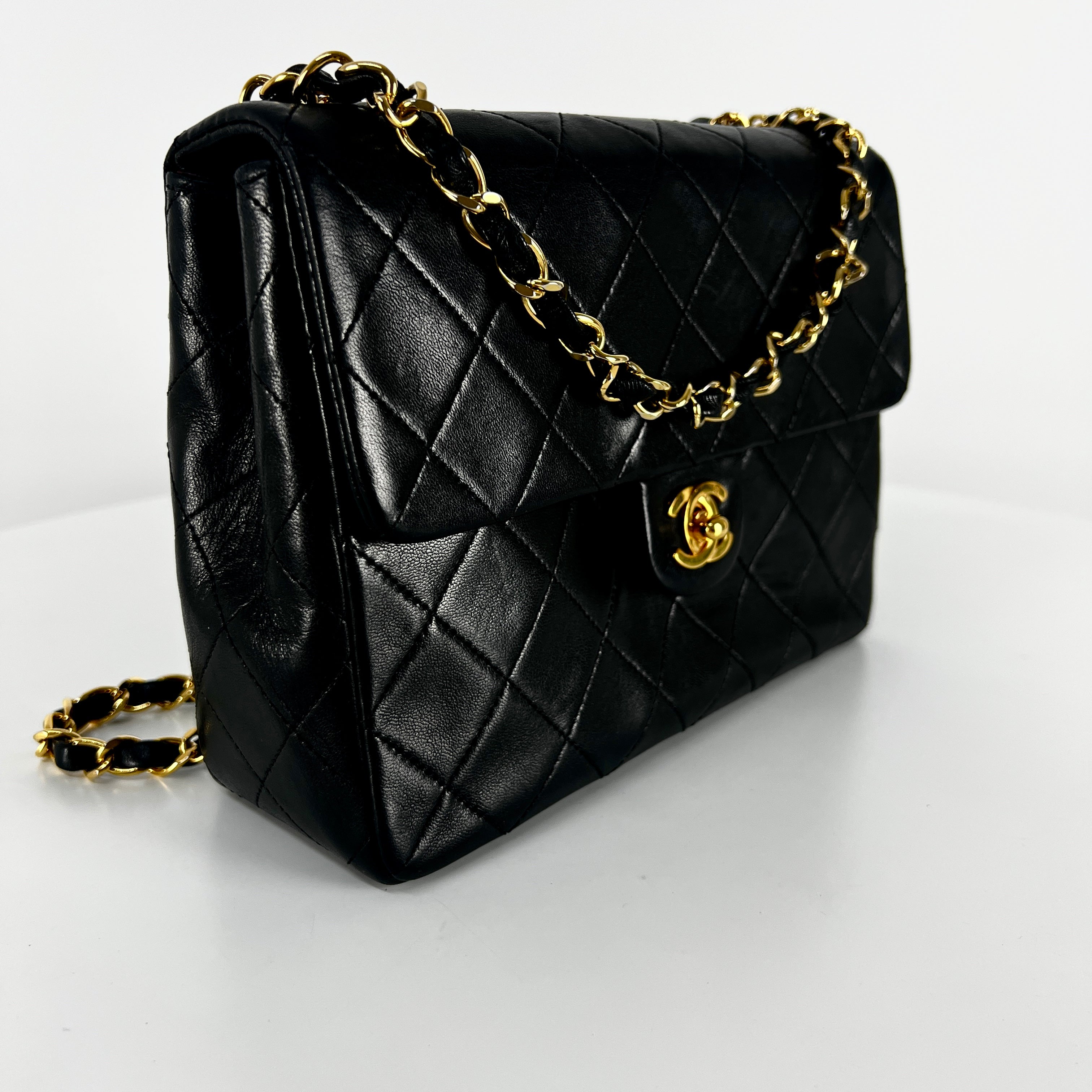 CHANEL Timeless classic mini flap black leather handbag
