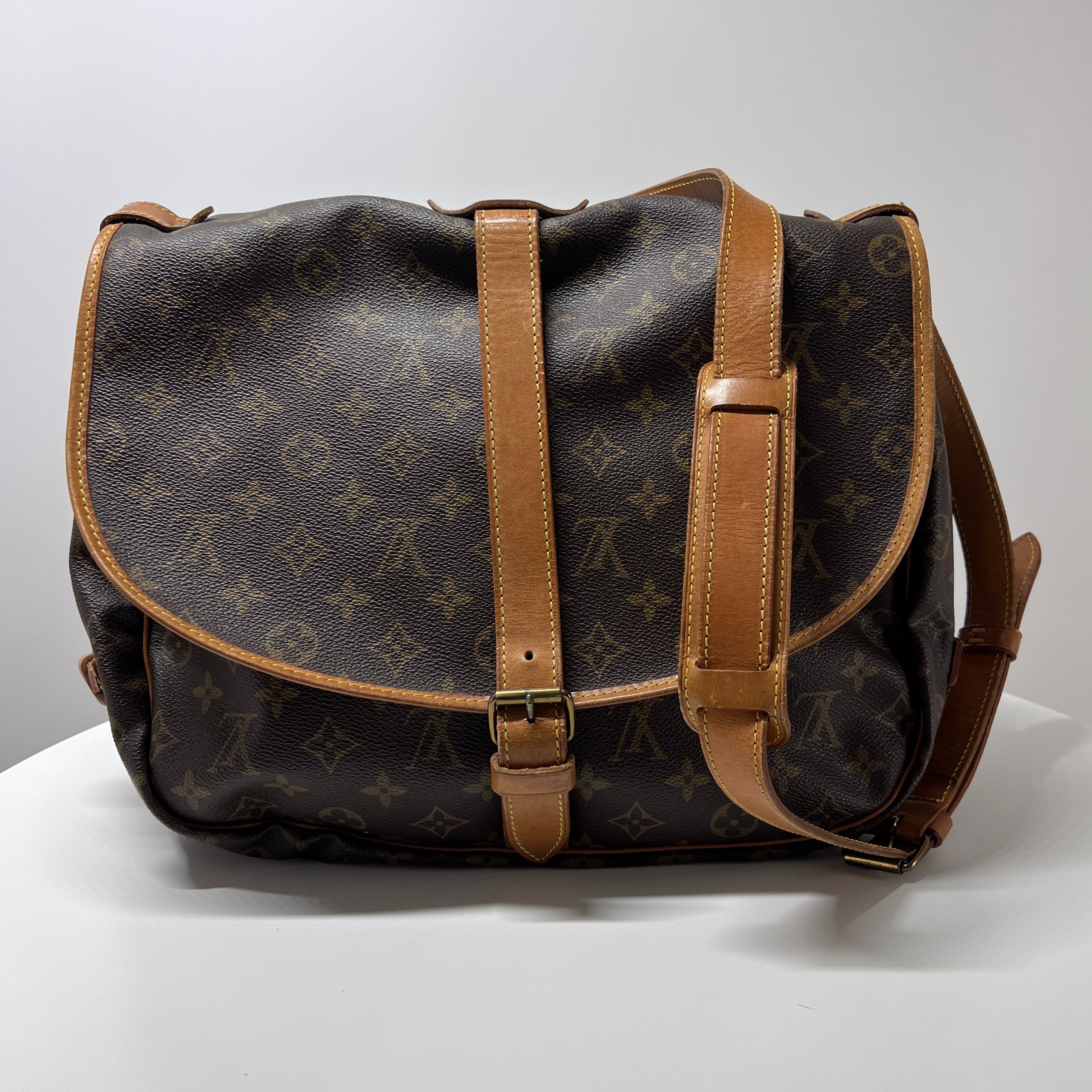 Sac à main LOUIS VUITTON Saumur 35 toile et cuir marron