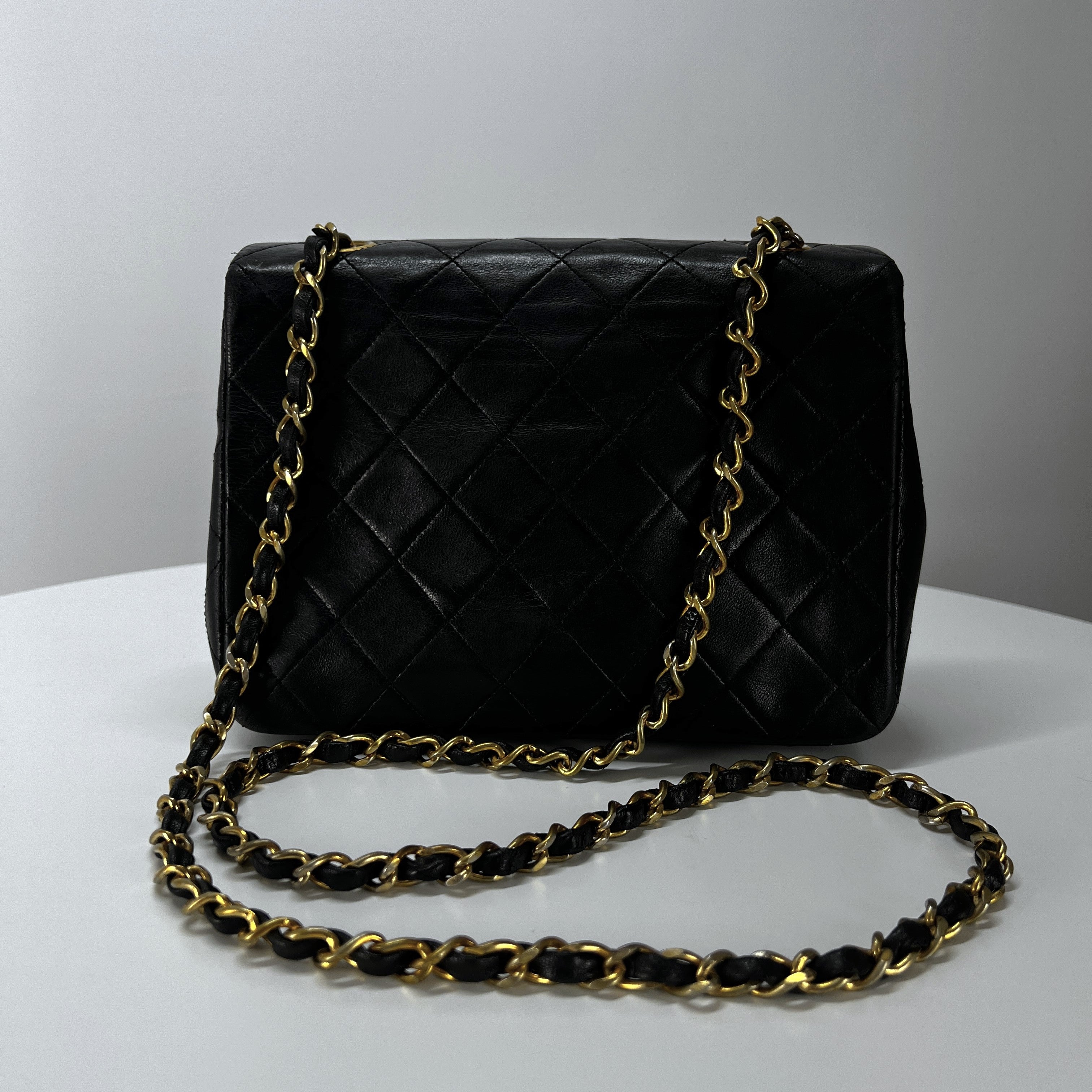 CHANEL Timeless classic mini flap black leather handbag