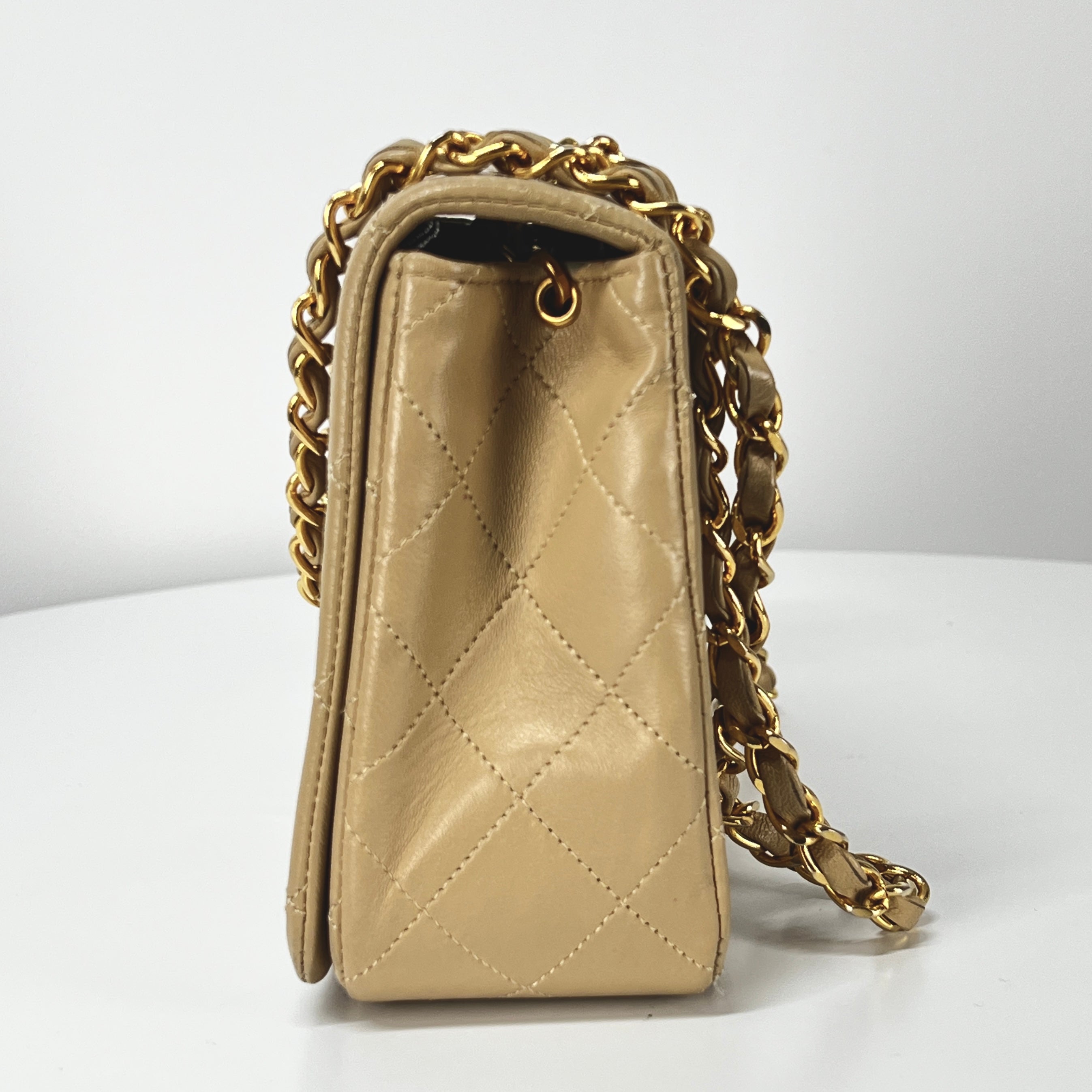 CHANEL Timeless classic quilted single flap beige leather handbag