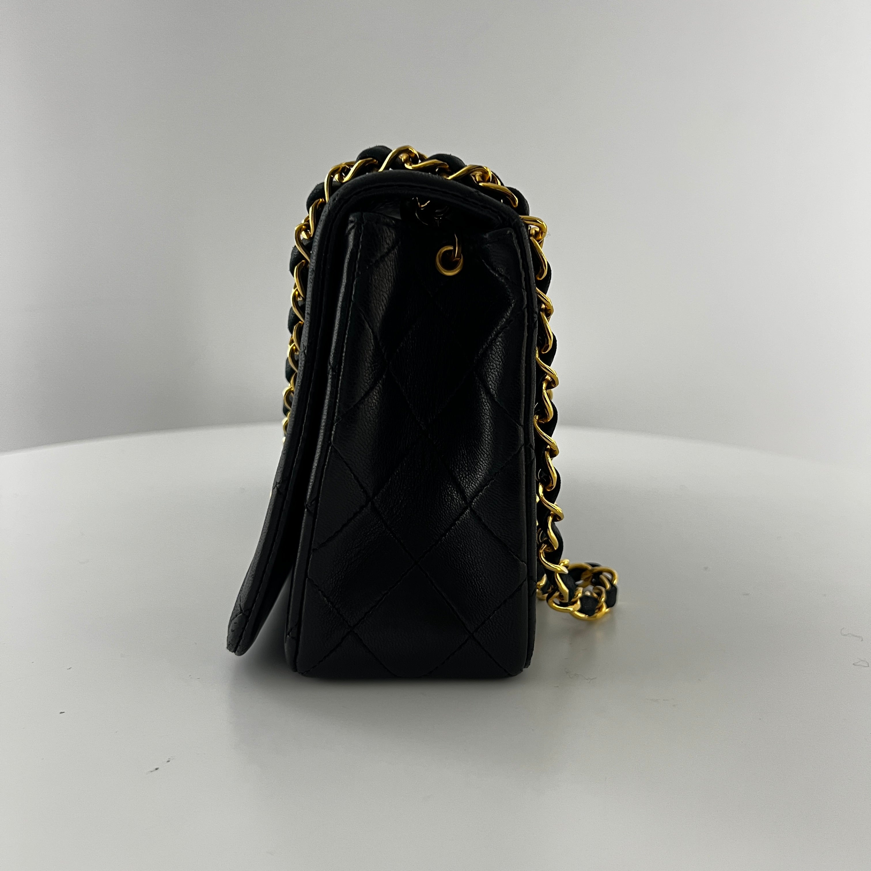 CHANEL Timeless classic quilted single flap black leather handbag