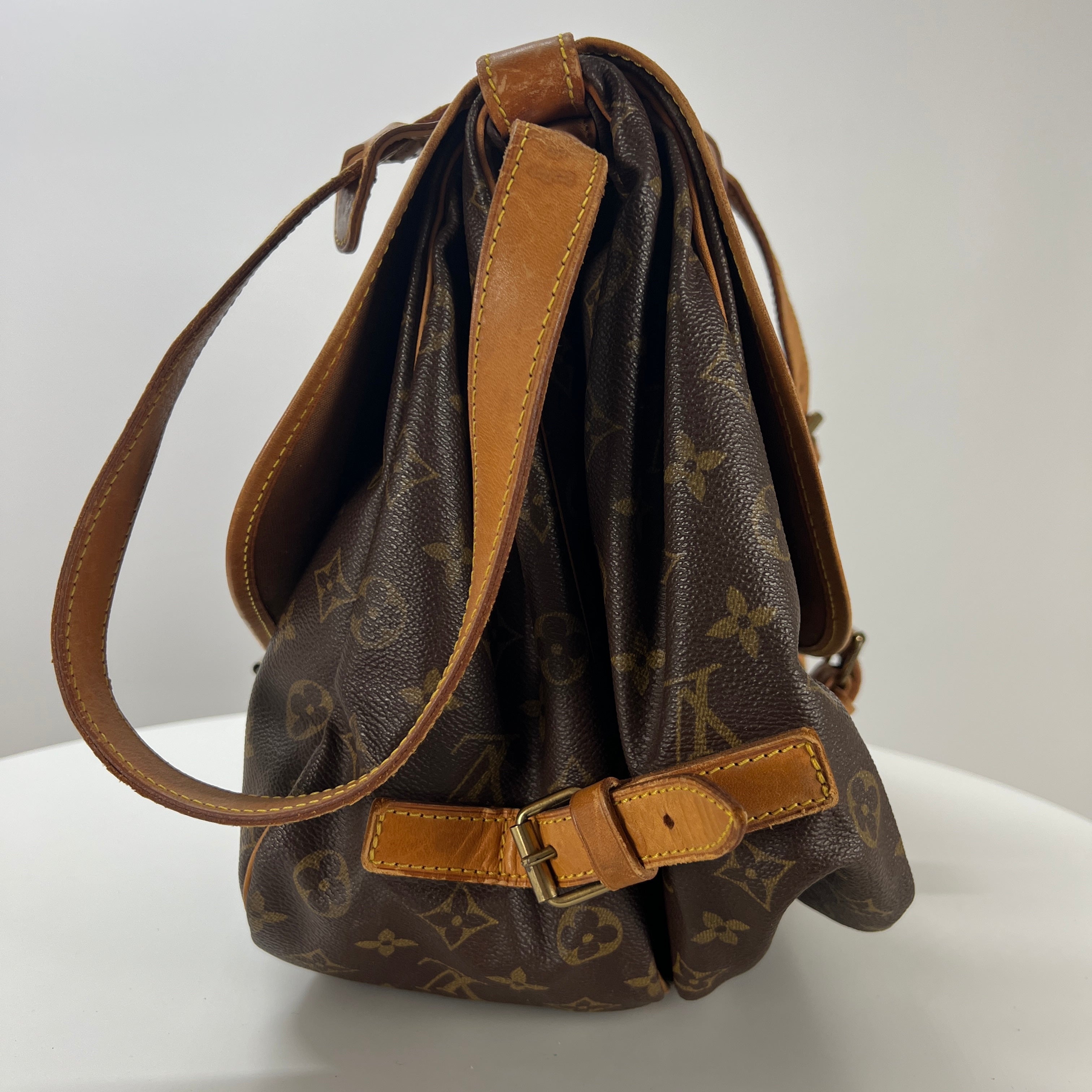 LOUIS VUITTON Saumur 30 canvas and brown leather handbag