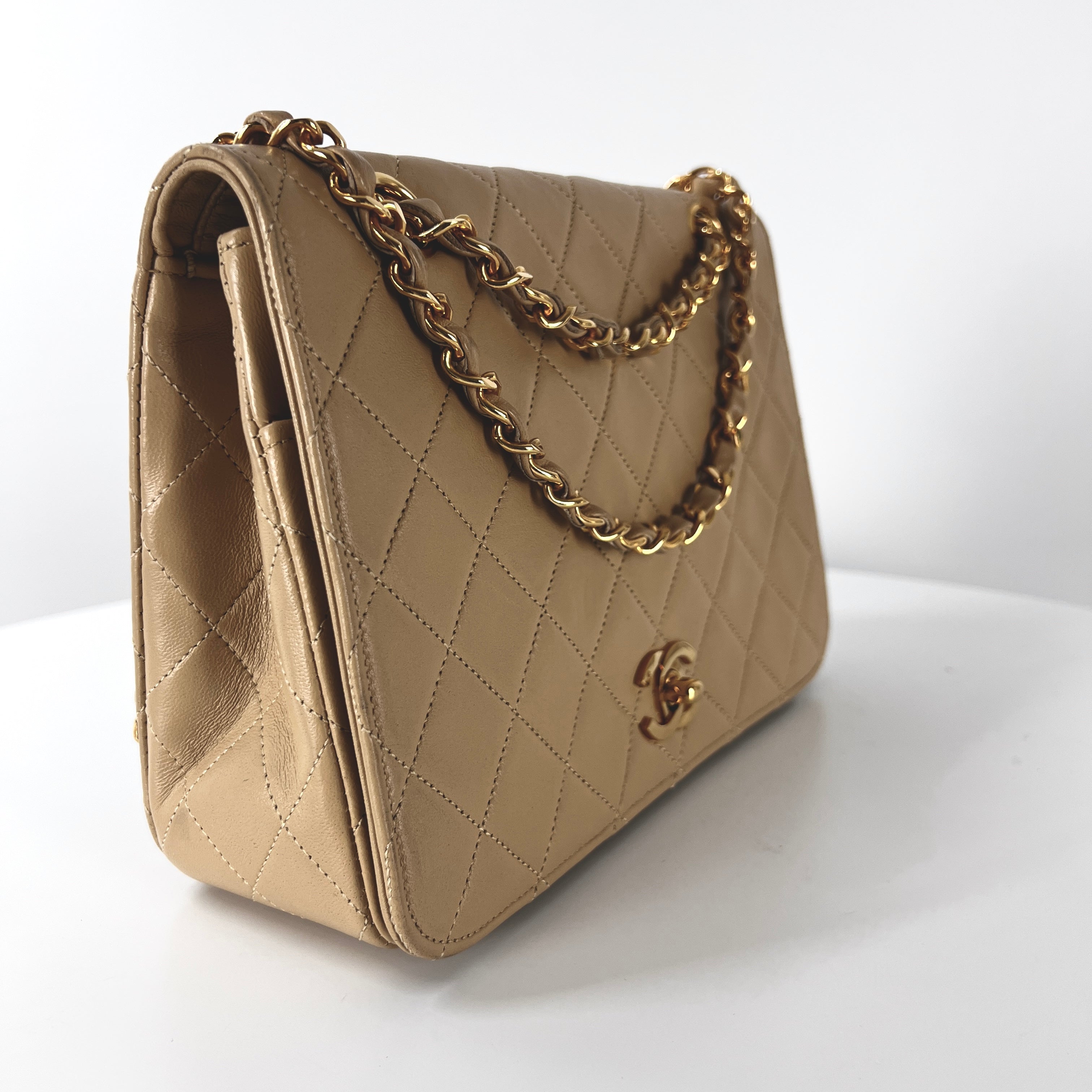 CHANEL Timeless classic quilted single flap beige leather handbag